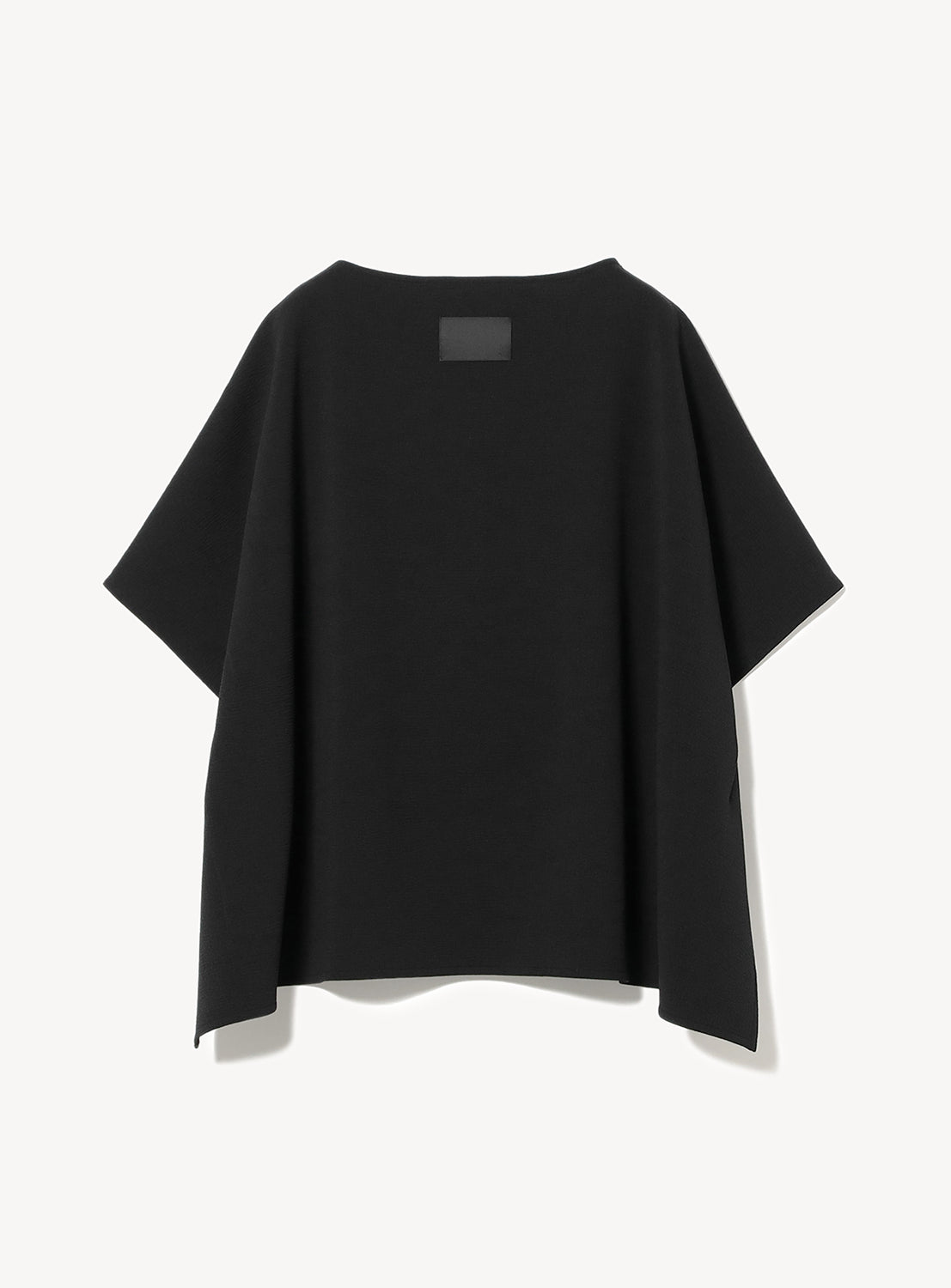 Back of a black poncho inspired flowy shirt.