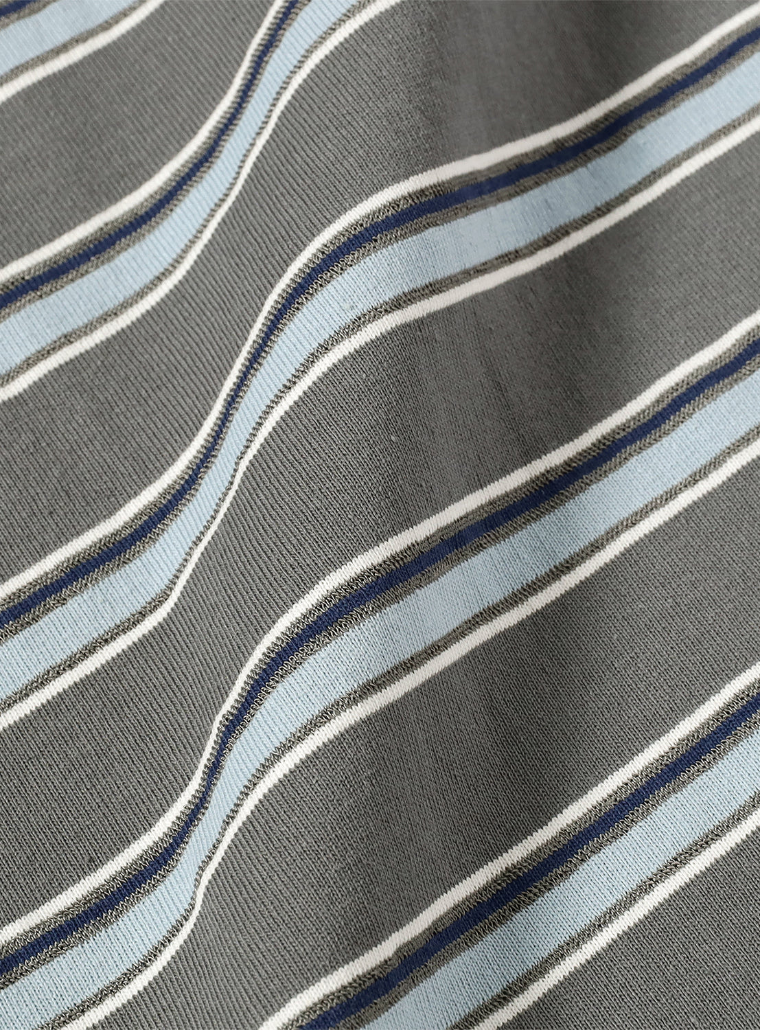 Close-up of the striped material, highlighting the stripe pattern.