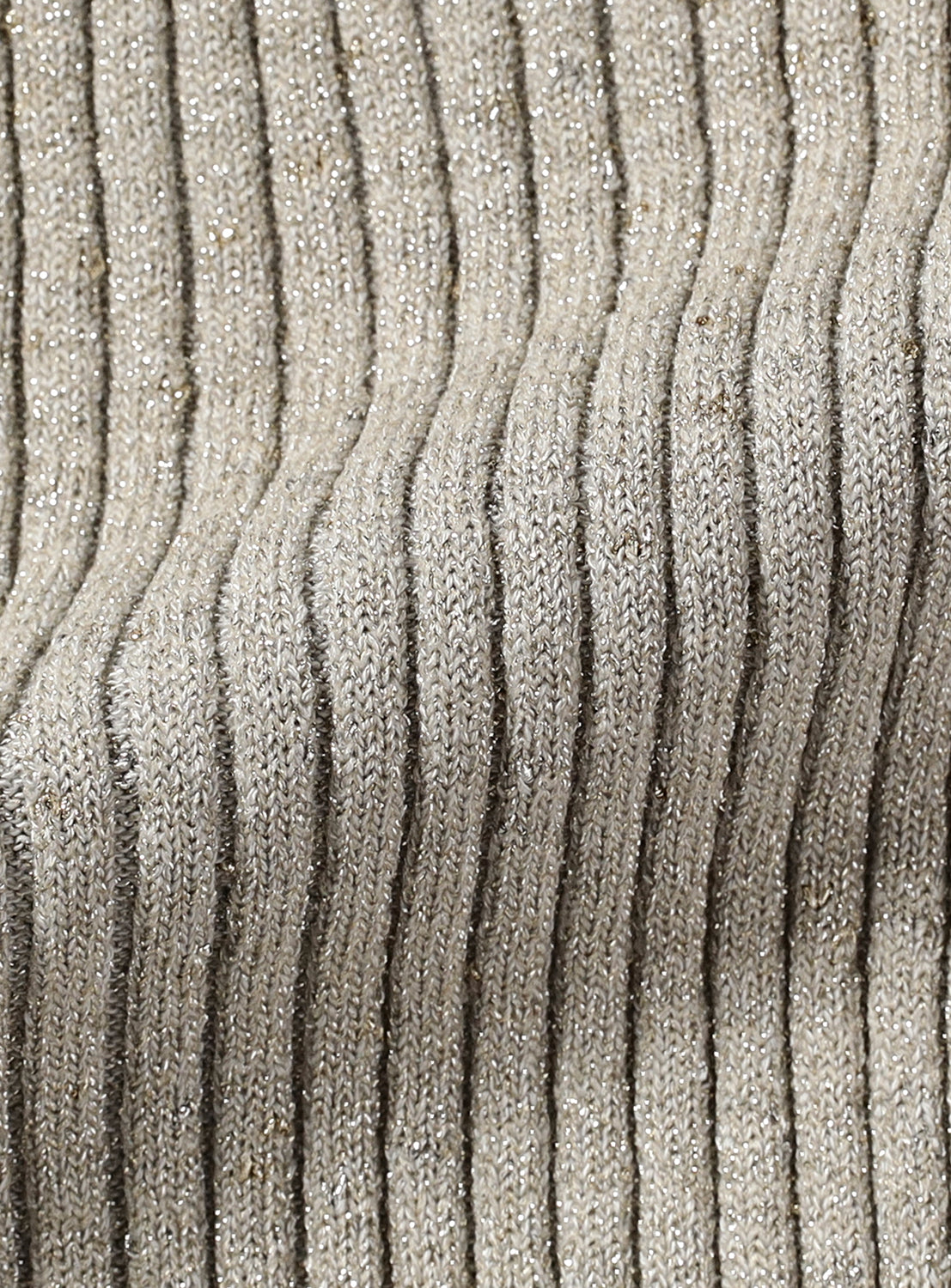 Close-up of grey textured fabric with ribbed pattern.
