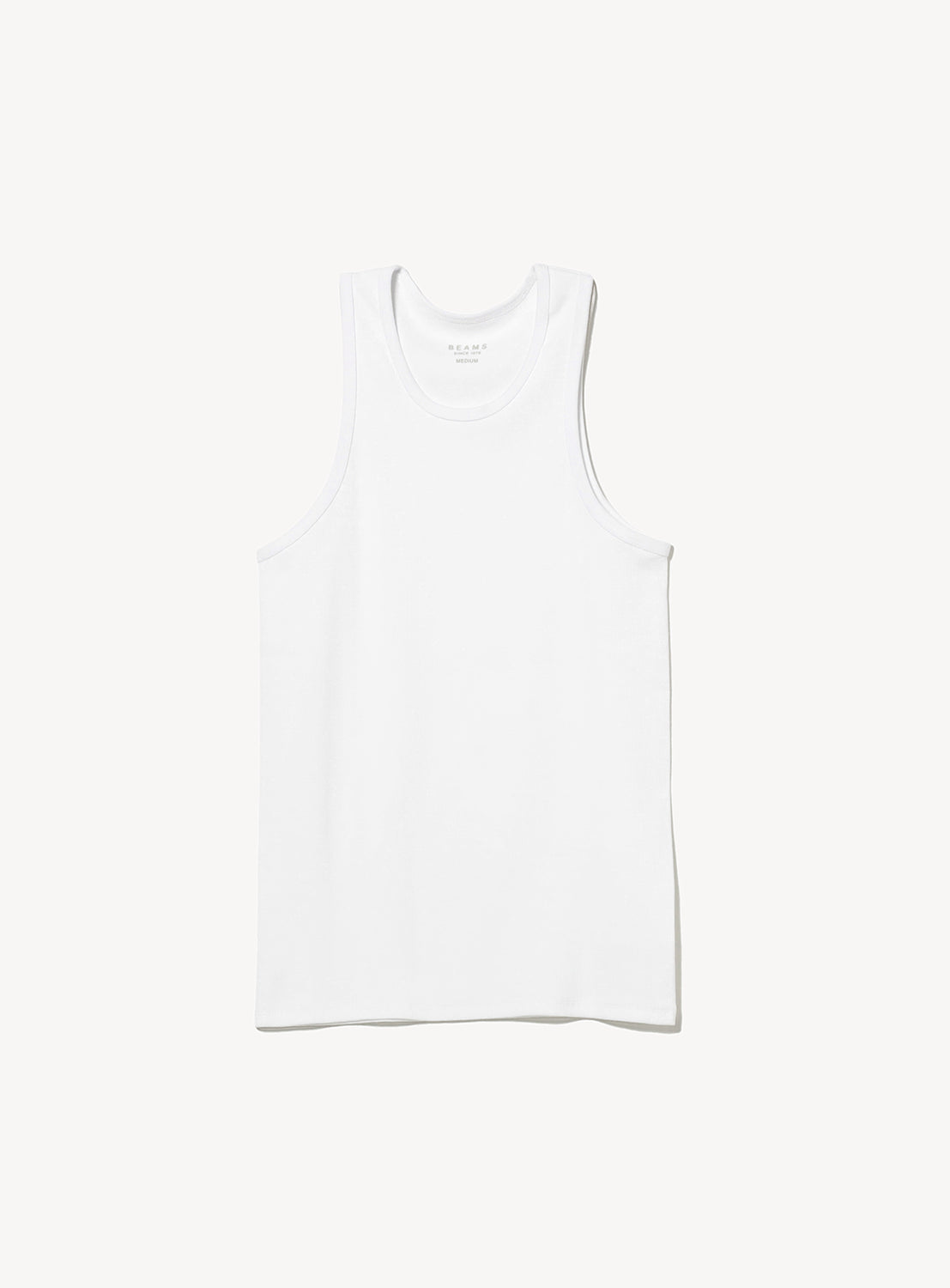 A crisp white ribbed tank top with a classic scoop neck.