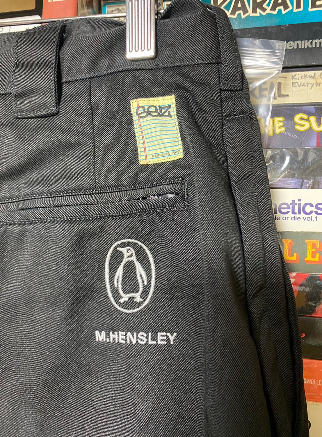 Close-up of a back pocket, showing the SSZ and Flying Elephant branding from the Matt Hensley collection.