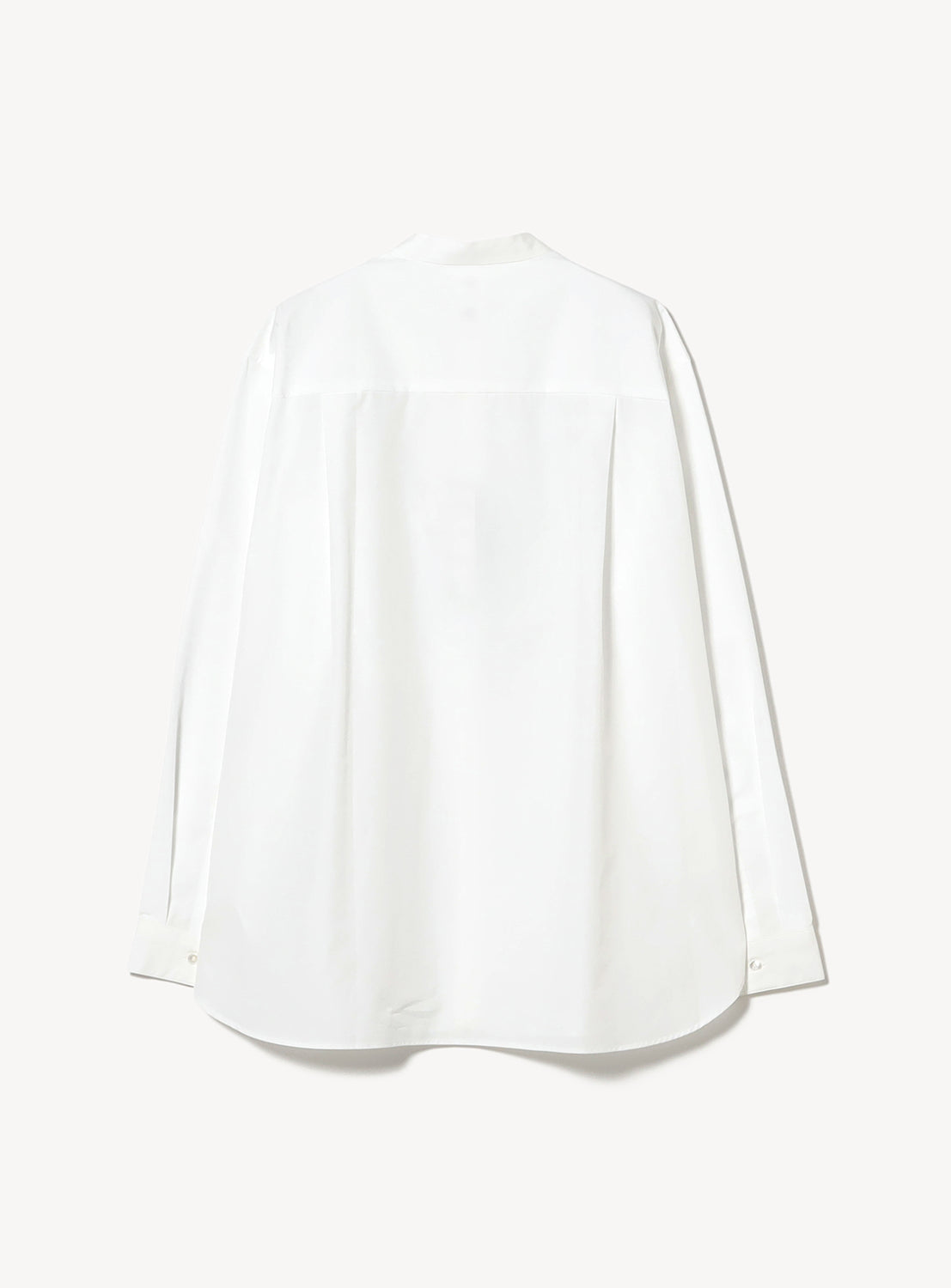 Back of a white long sleeve blouse.