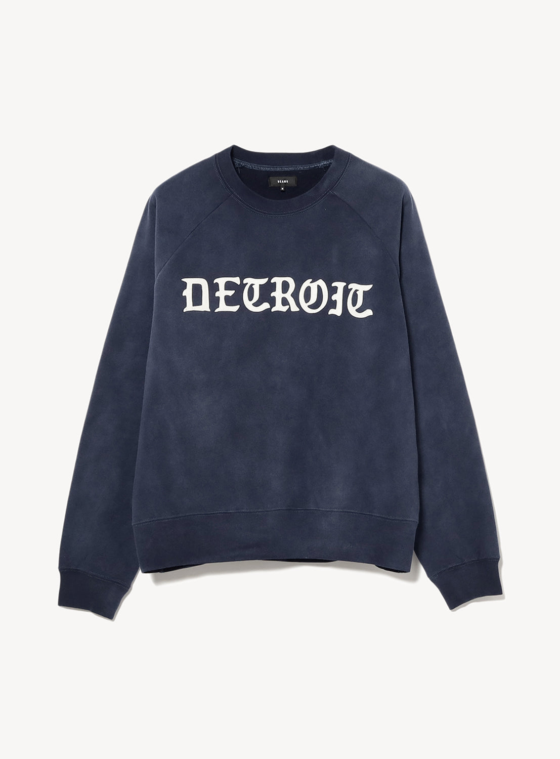 A navy blue crew neck sweatshirt with the word 'DETROIT' printed in white on the front.