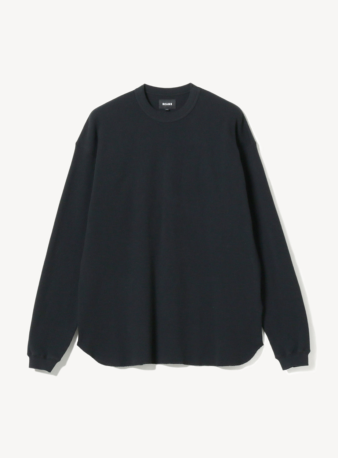 A black long-sleeve crewneck thermal top.