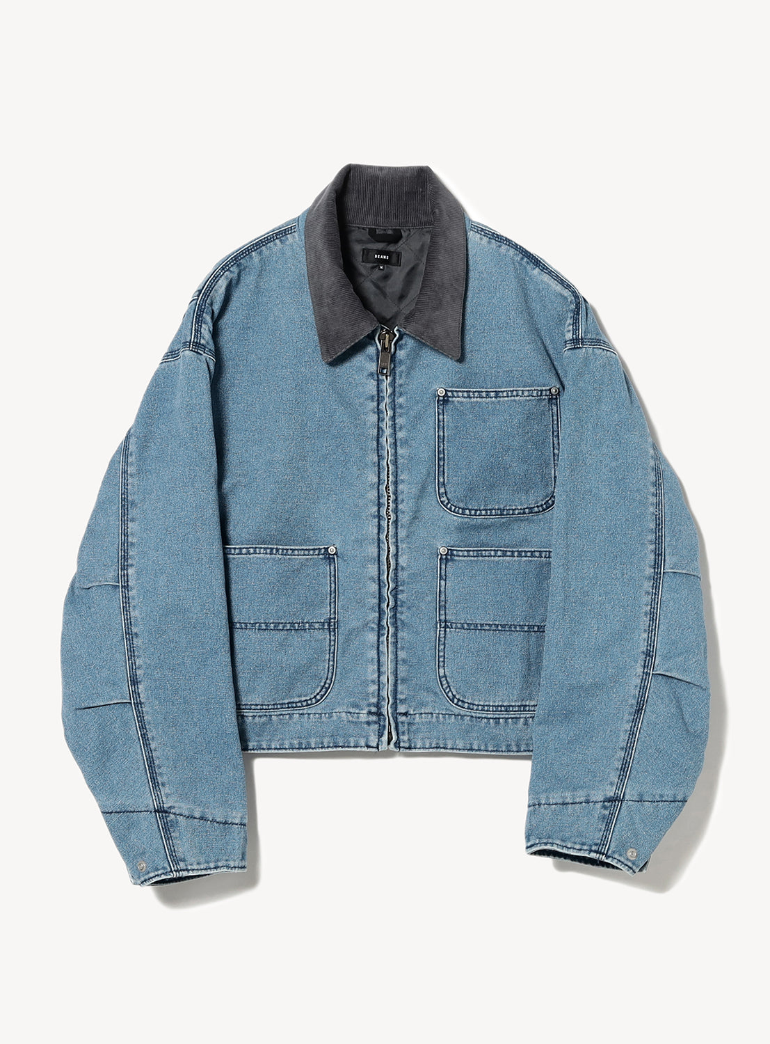 A faded blue denim blouson jacket with a dark collar, multiple pockets, and a zip-up front.