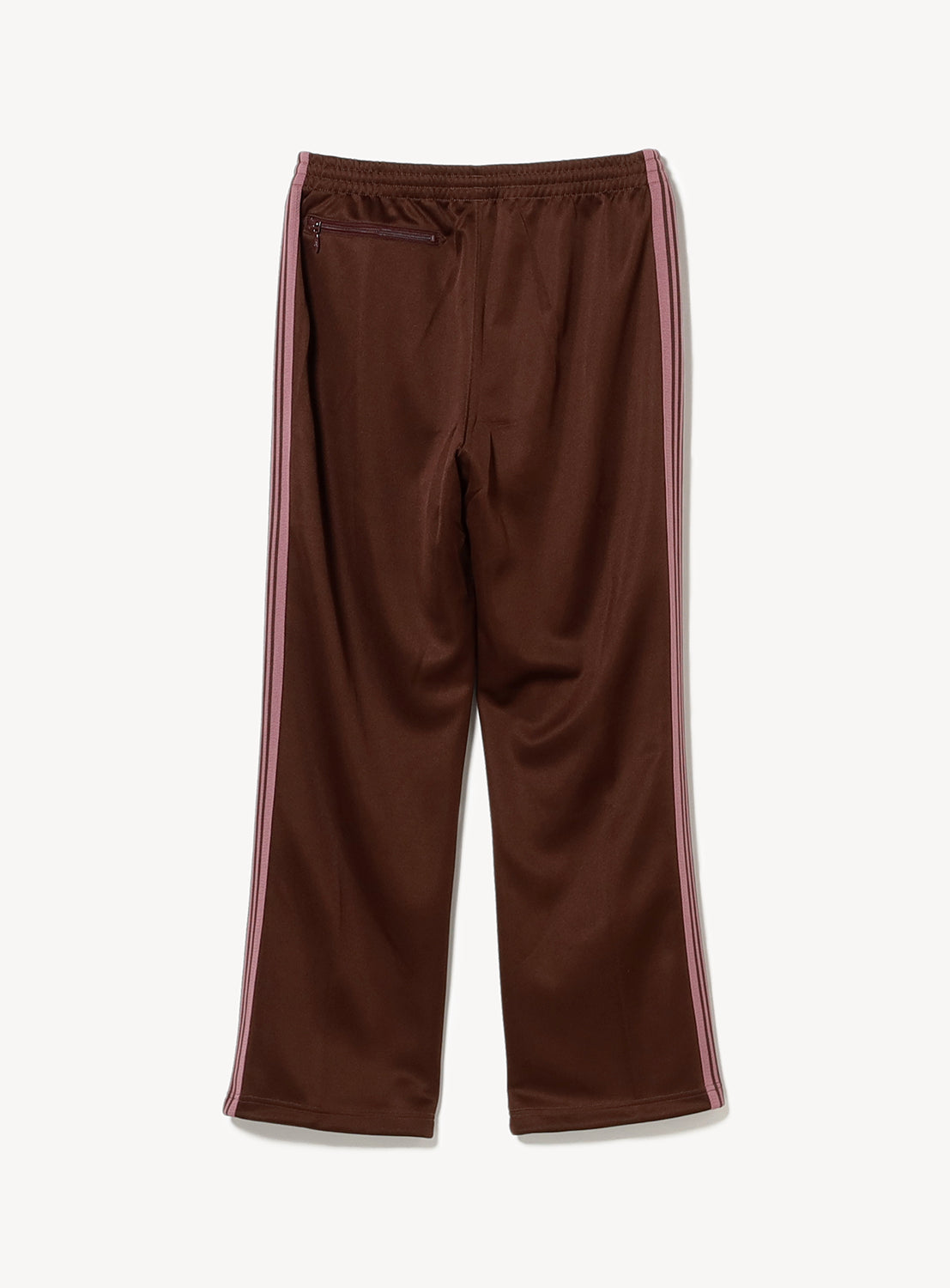 Back of brown/burgundy track pants with pink stripes on the side and a side zipper pocket.