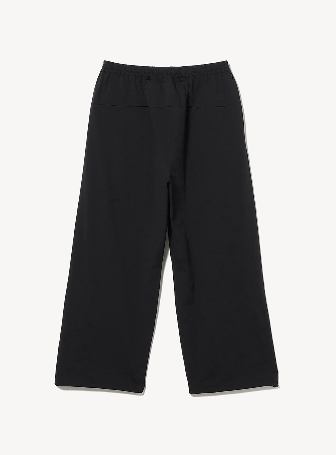 The BEAMS Wide Straight Fit Dynamic Dry Easy Pants are black, wide-leg pants crafted from quick-drying fabric and feature an elastic waistband. Displayed against a plain white background, they offer a relaxed fit with no visible patterns or embellishments.