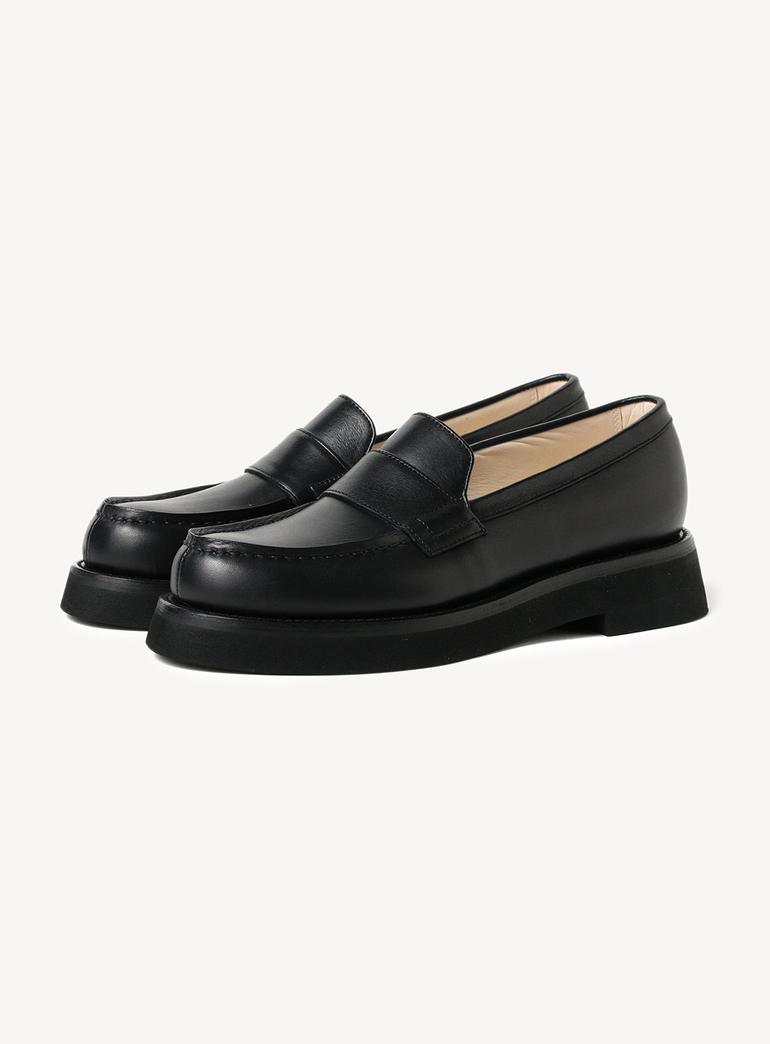 Pair of black kip leather loafers.