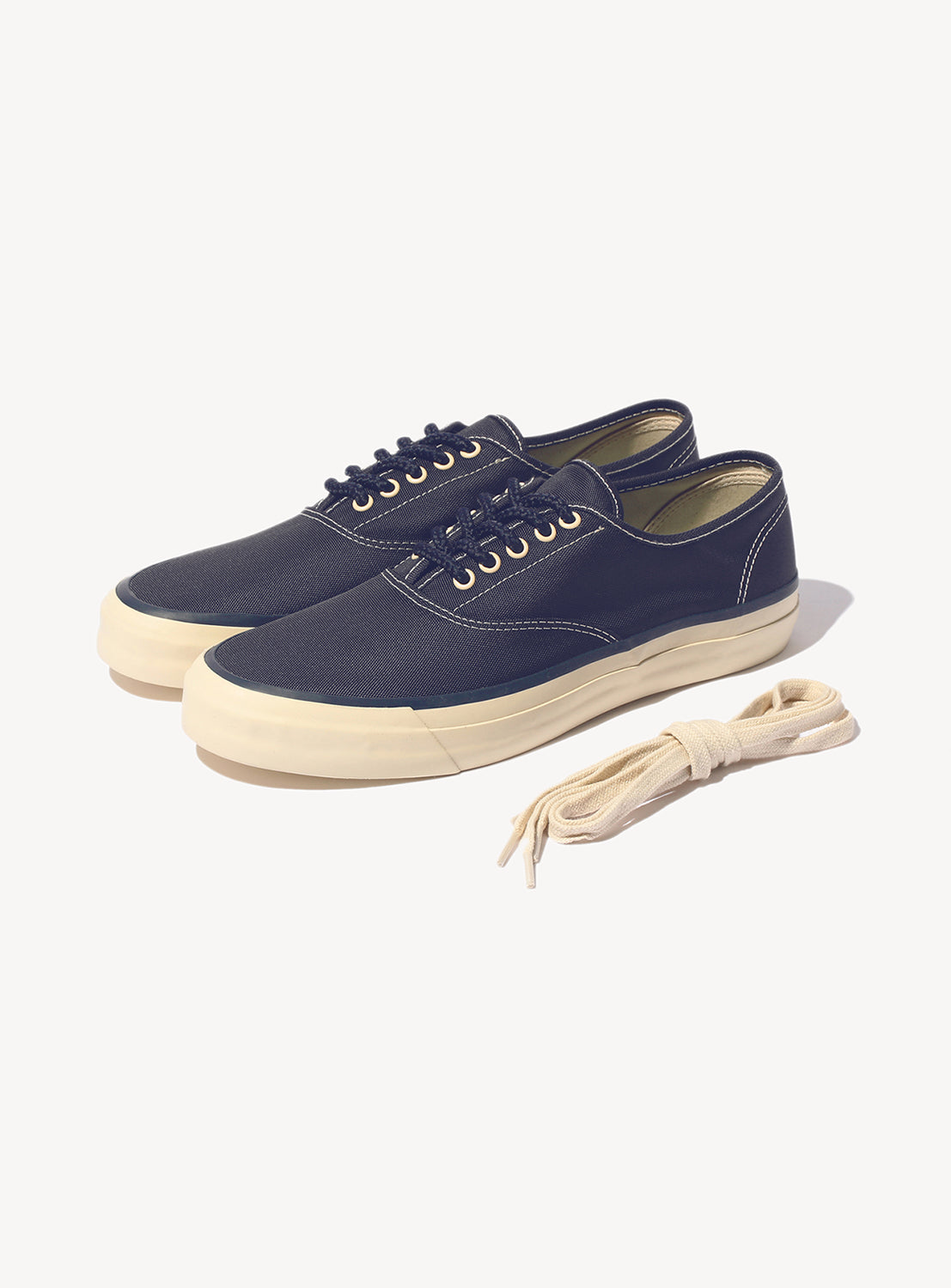 Navy blue Sperry showcasing the interchangeable shoe laces.