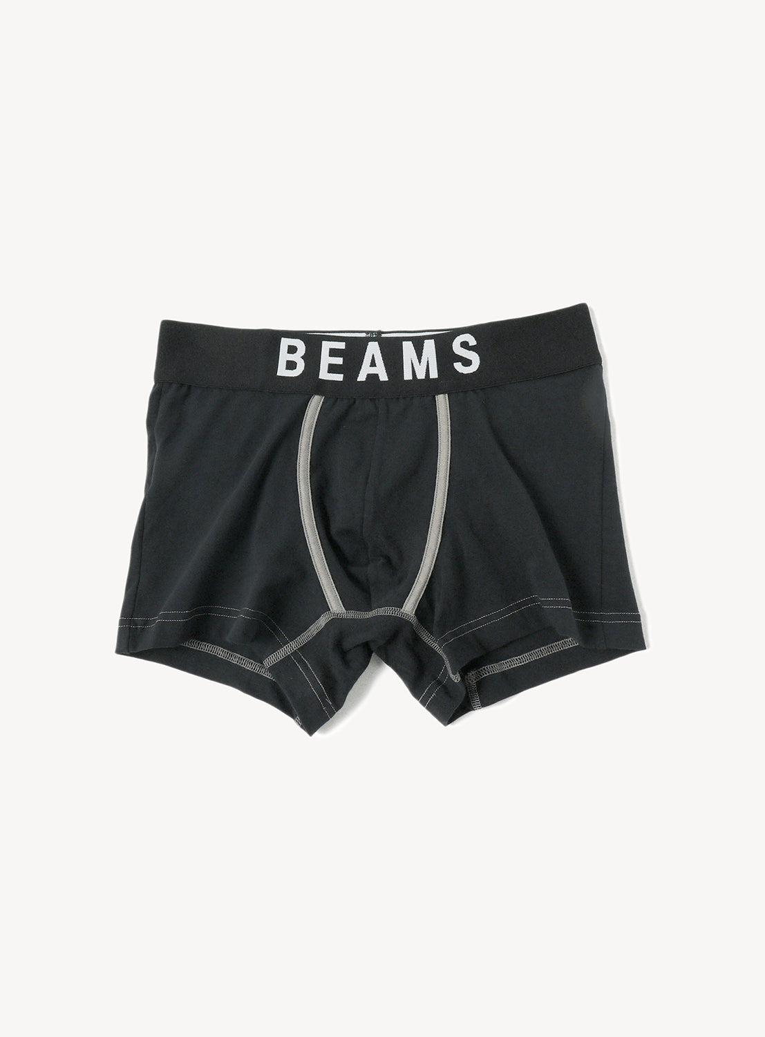 Black boxer shorts with an elastic waist with 'BEAMS' text in white.
