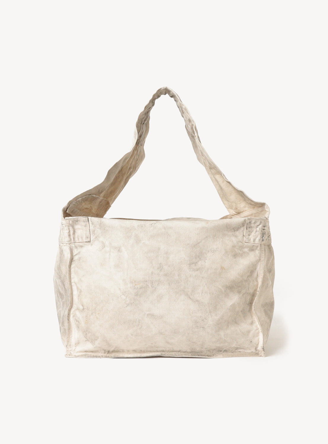 Back view of a white canvas tote bag with a single shoulder strap.