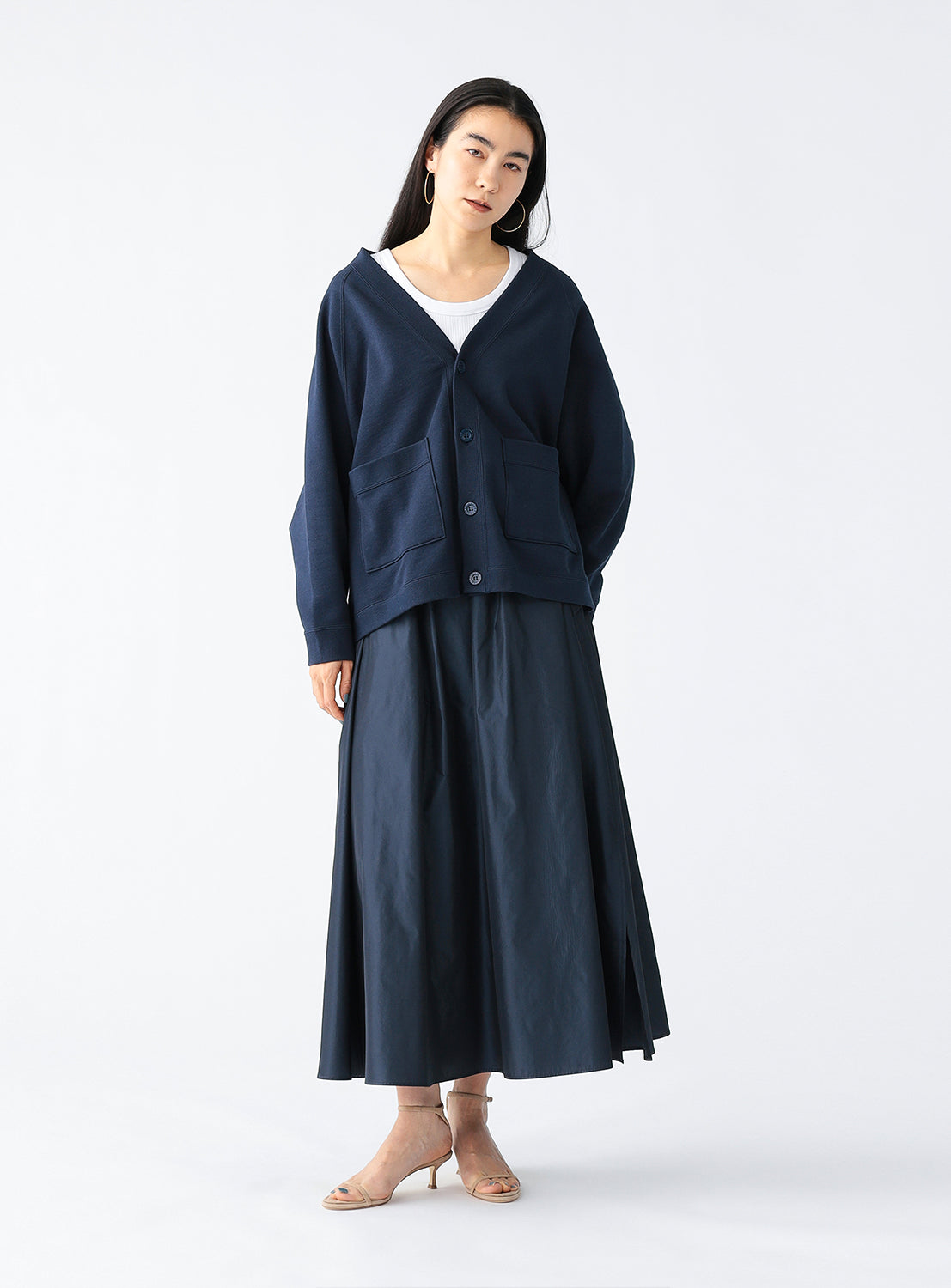 Model wearing the navy blue cardigan.