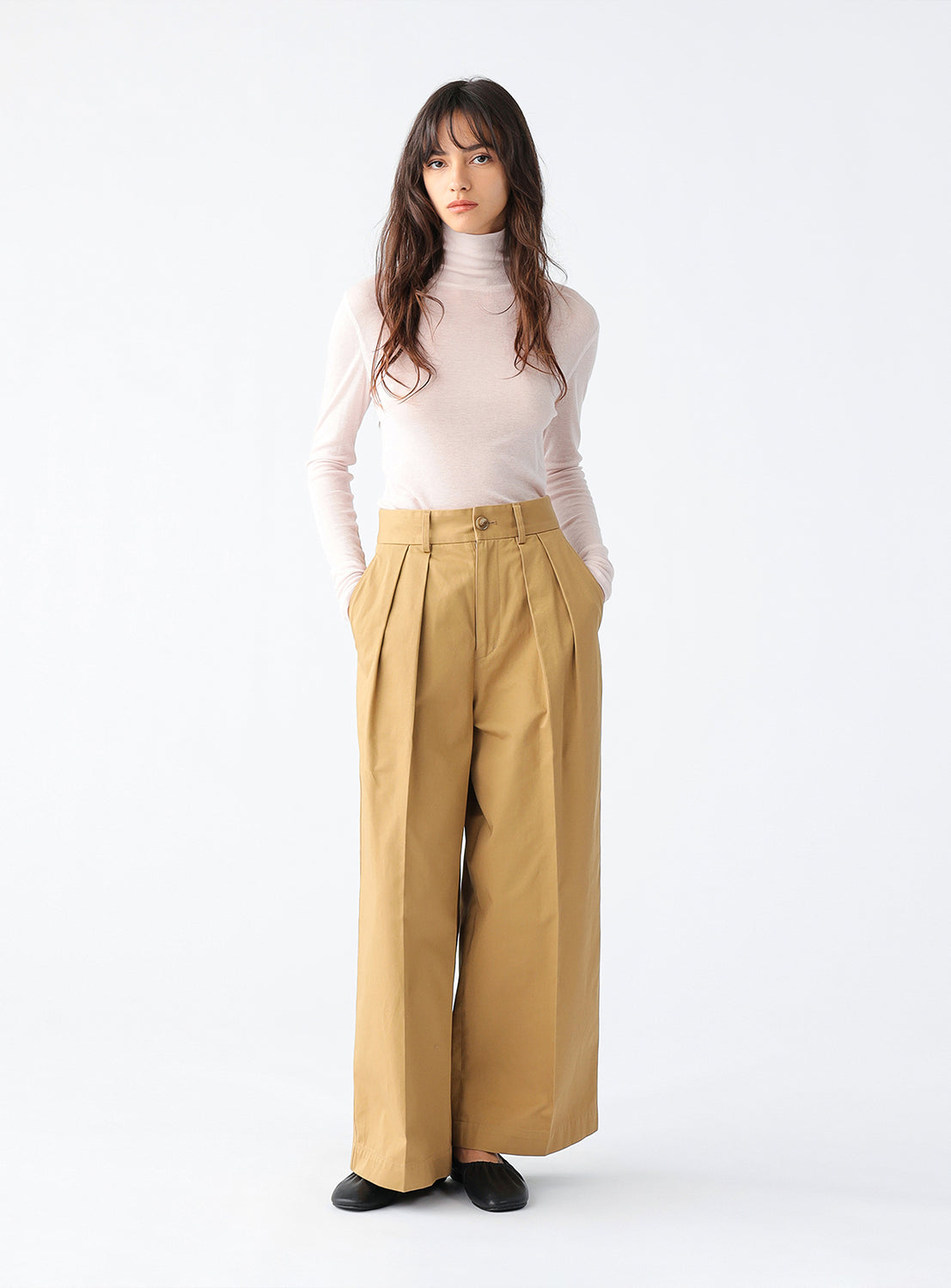 Model wearing the sheer pink long sleeve.