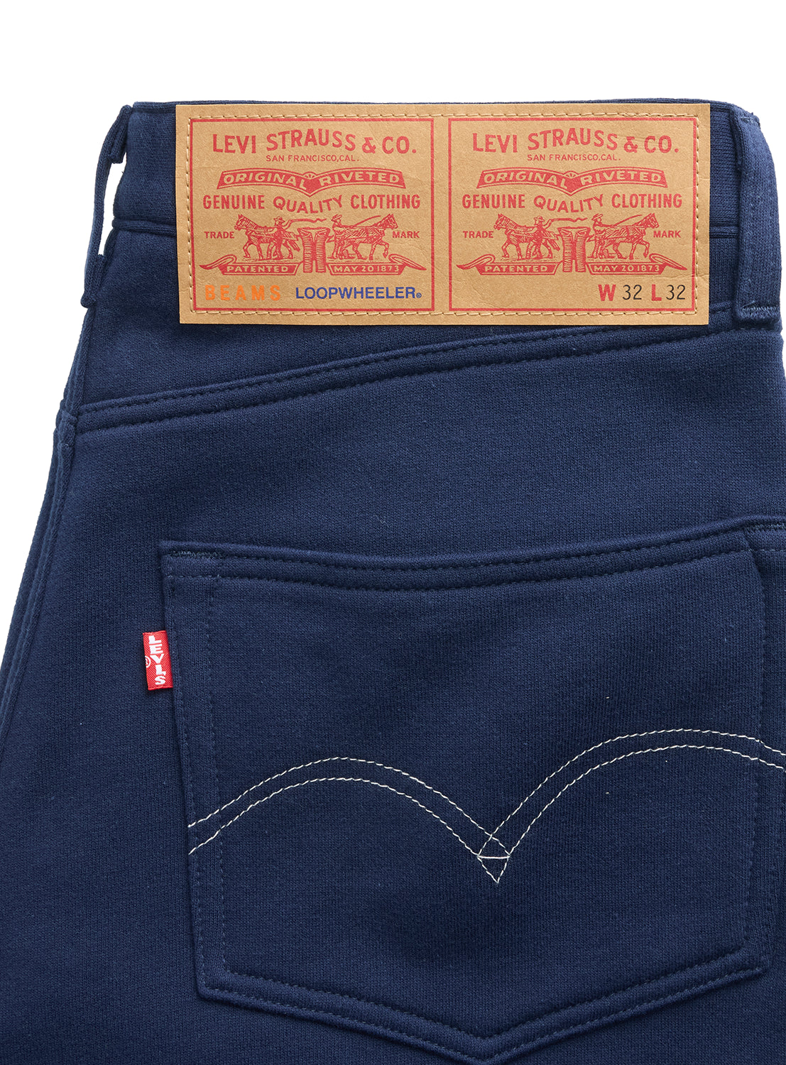 Levi’s® x BEAMS x Loopwheeler Superwide pants: dark blue, dual waist patches, arched stitching.