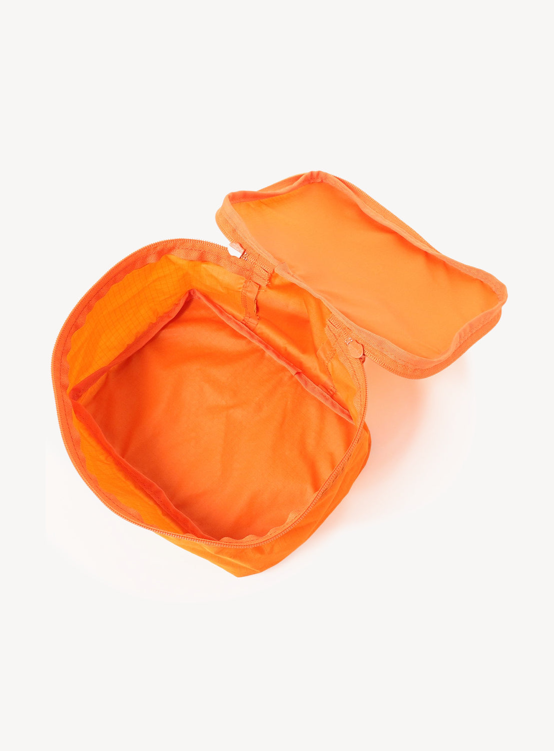 Orange dental mouthguard case on a white background