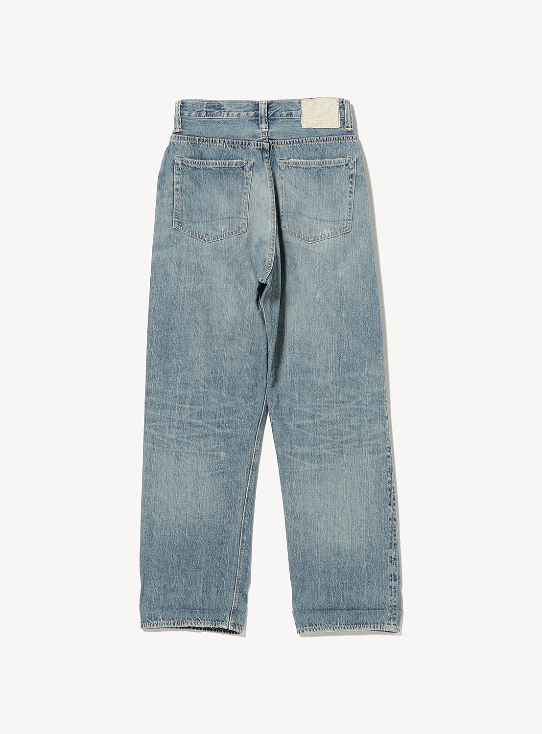 Light blue denim jeans on a white background