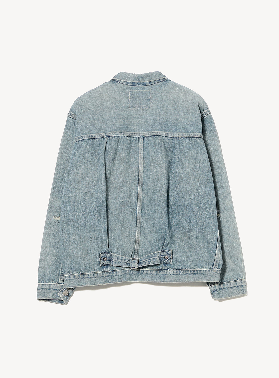 Light blue denim jacket on a white background