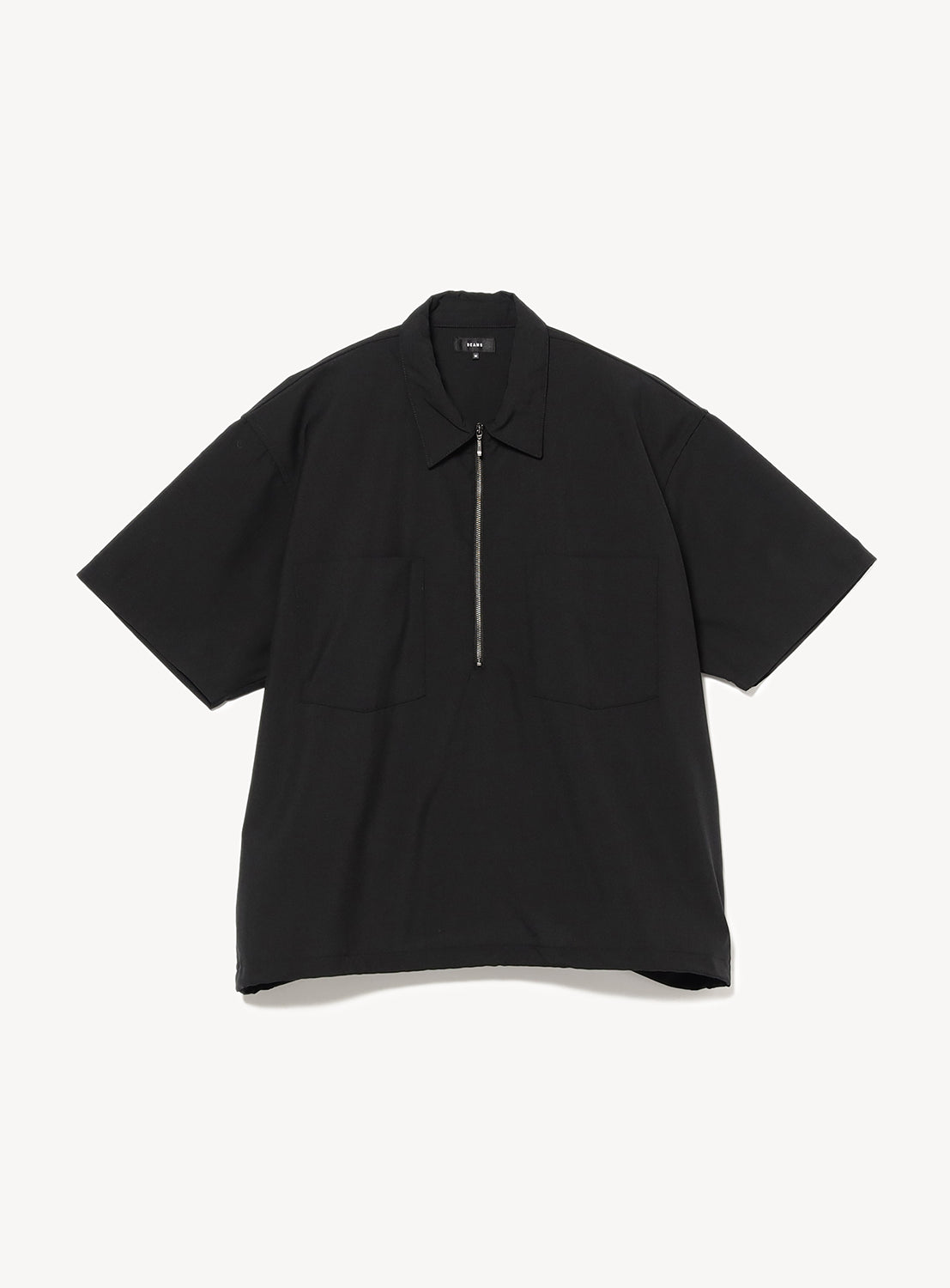 Black short-sleeve pullover shirt with a silver zipper.