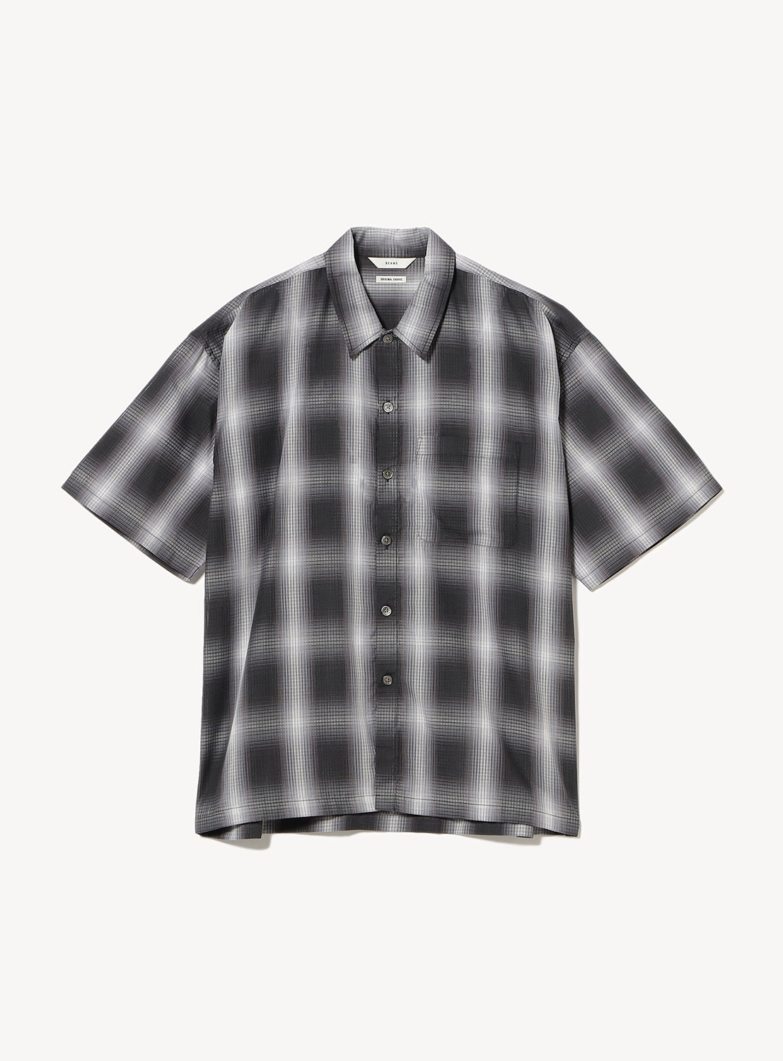 Black large plaid short-sleeve polo shirt.