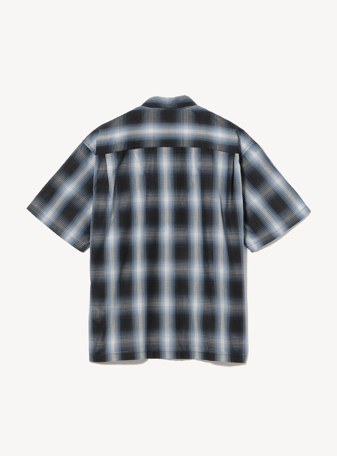 Back of blue and black large plaid short-sleeve polo shirt.