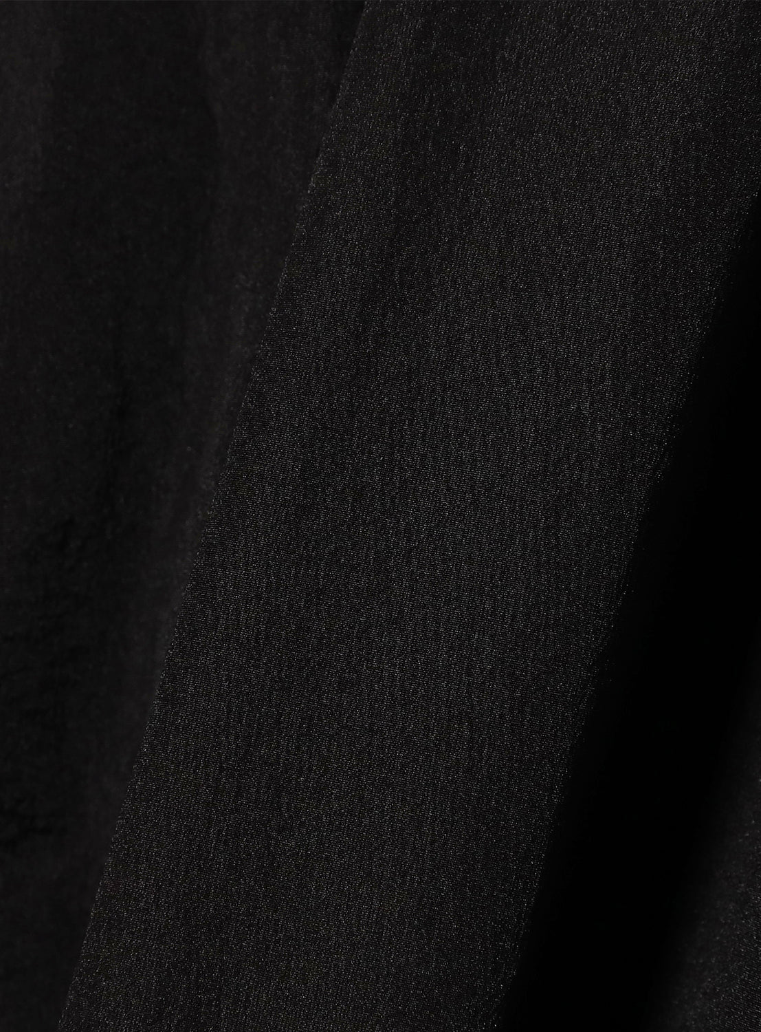 Close up of black fabric material. 