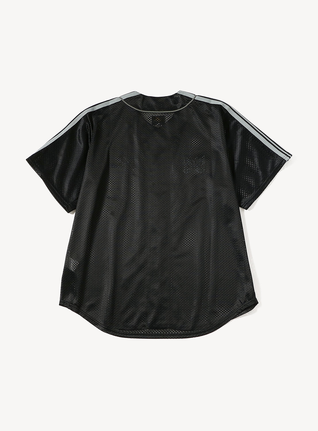 Introducing the [Exclusive] Needles 50th Baseball Shirt by NEEDLES: This black short-sleeve athletic jersey features a breathable mesh texture, accented with a gray collar trim and three distinctive gray stripes down each shoulder. Laid flat on a white background, this baseball shirt delivers both comfort and standout streetwear appeal.