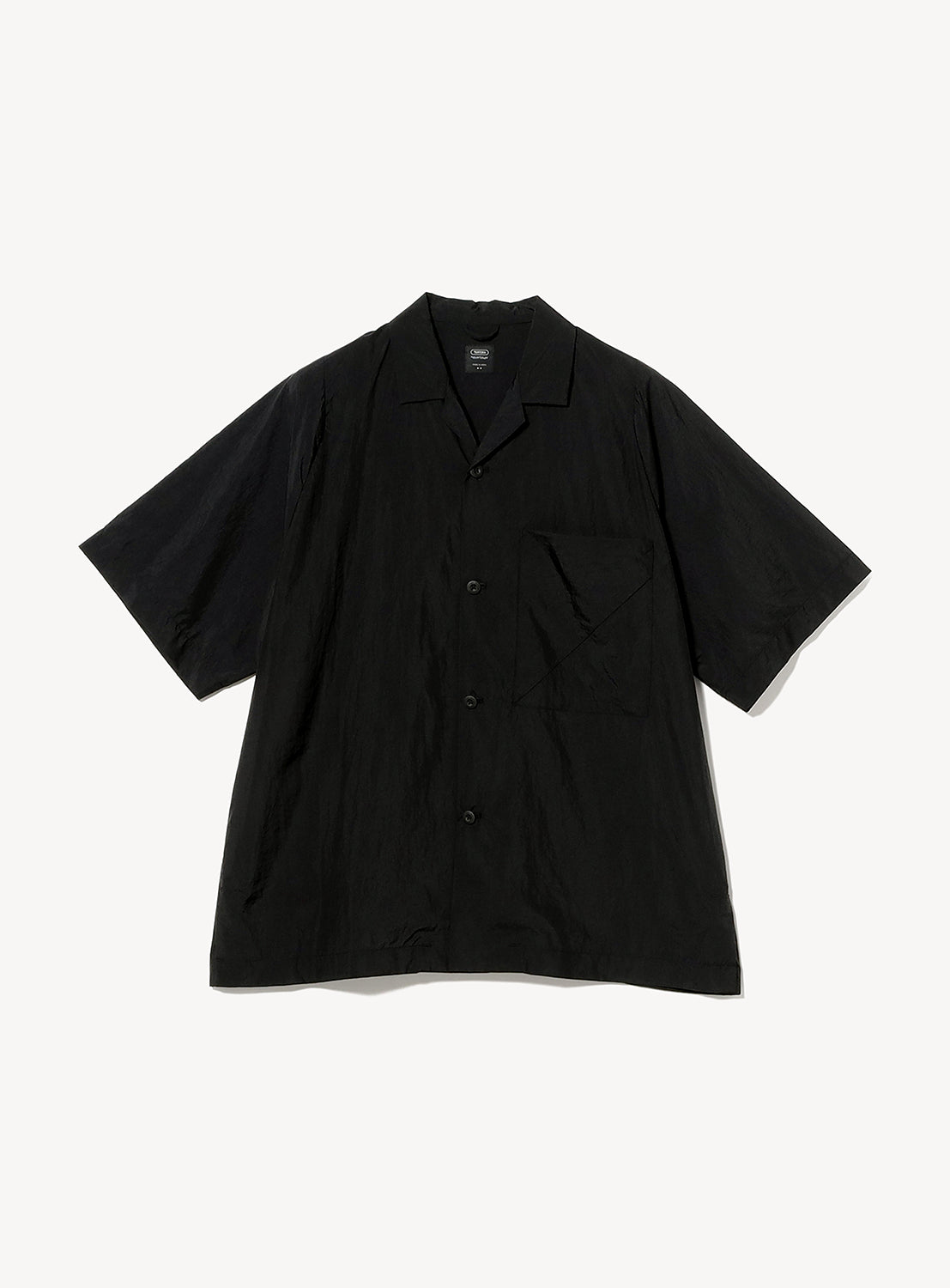 The TEATORA CAMBRIAN Short Sleeve Shirt - HOVER LAYER UNIT-01 by TEATORA is a lightweight performance black button-up featuring a collar and a single chest pocket, shown laid flat on a white background.