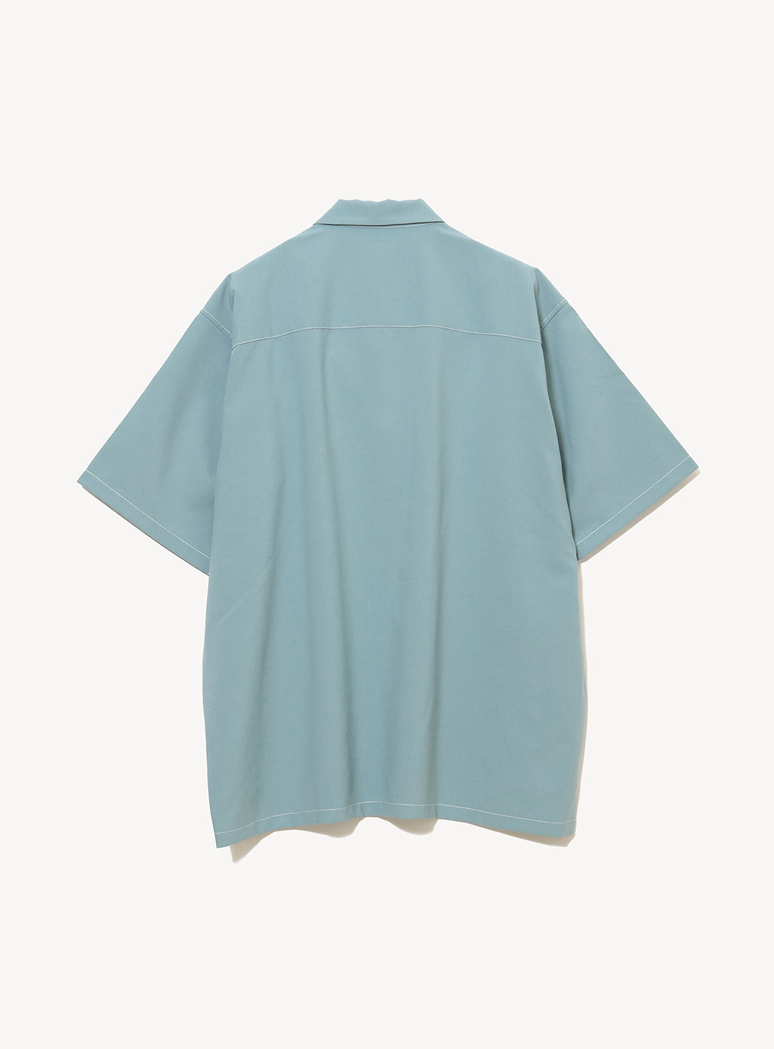Wide Fit Double Pocket Contrast Stitch Shirt by BEAMS in light blue, shown from the back with short sleeves, crafted from moisture-wicking performance fabric and displayed against a plain white background.