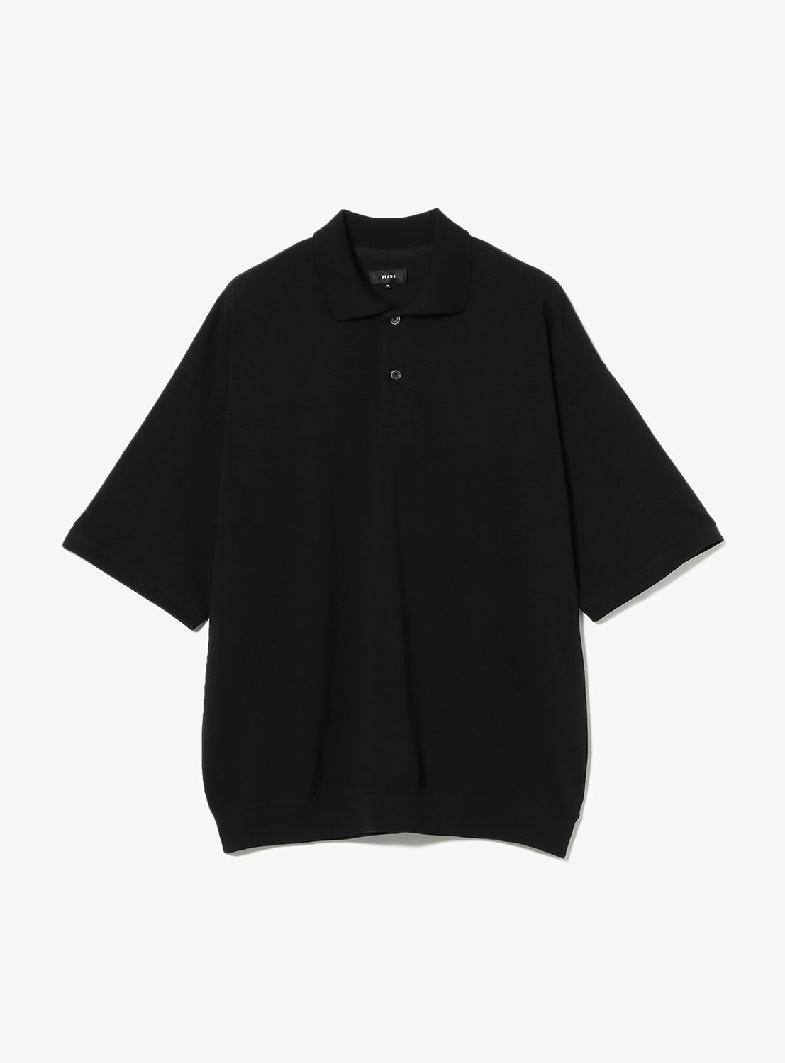 Black mesh polo shirt with matching black buttons.