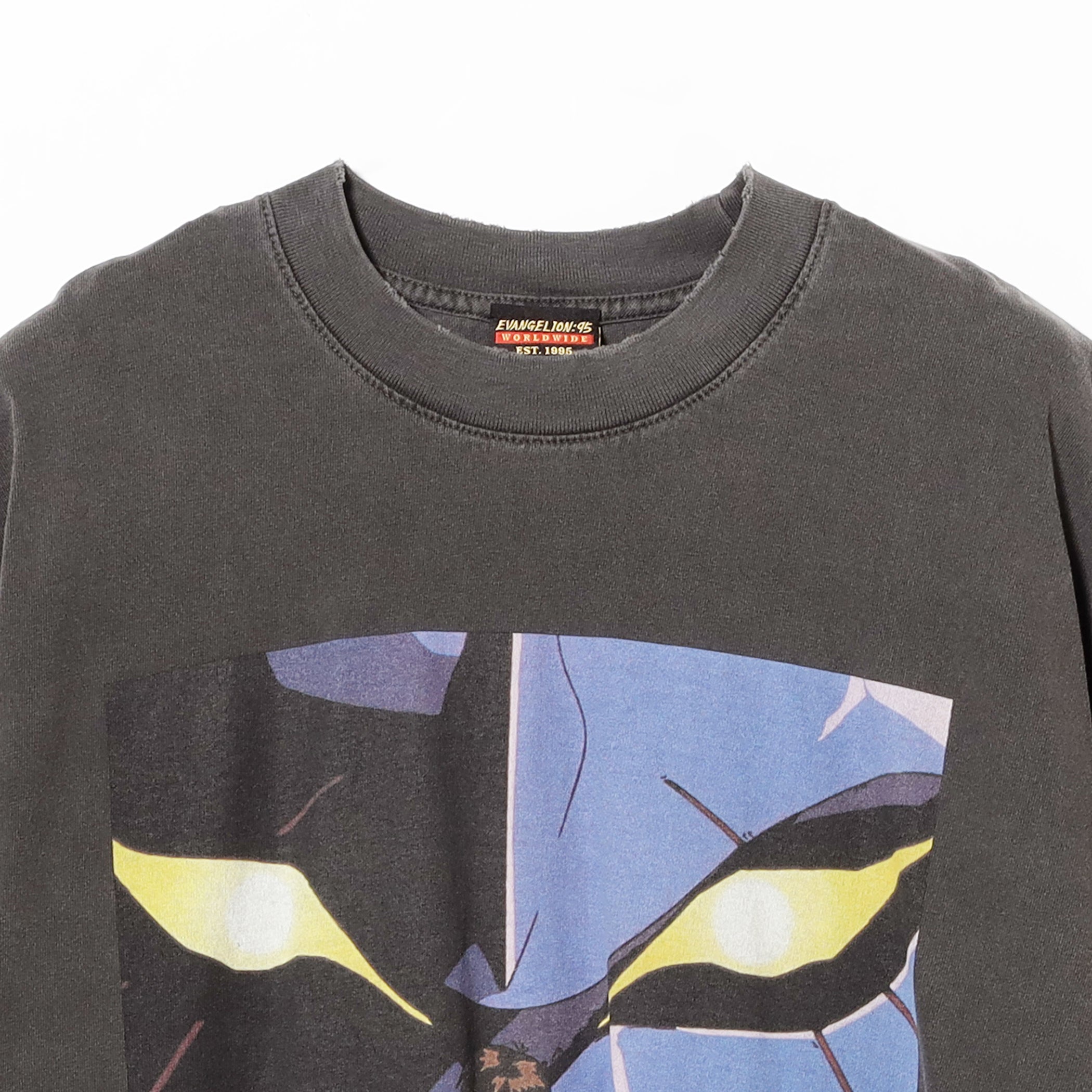 Top of the grey Evangelion tee, showing the neckline, branded tag, and the top of the graphic.