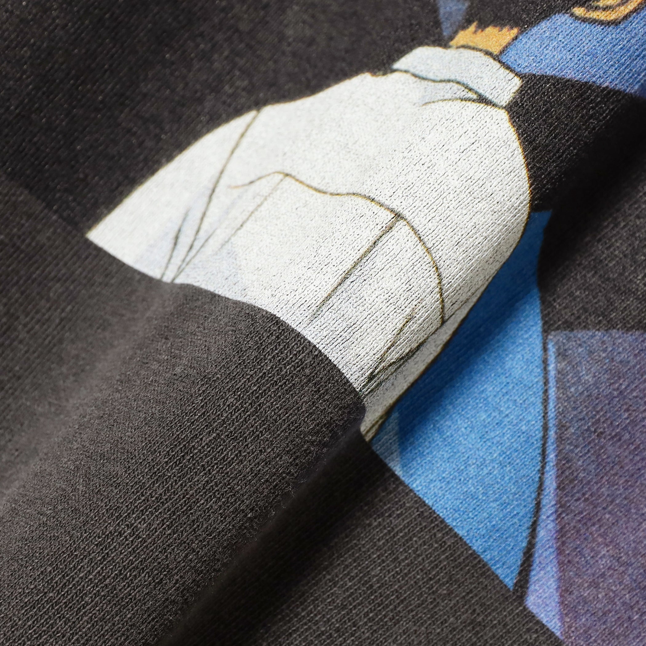 Close-up of the Unit-01 graphic, highlighting its signature color palette and soft jersey cotton fabric.