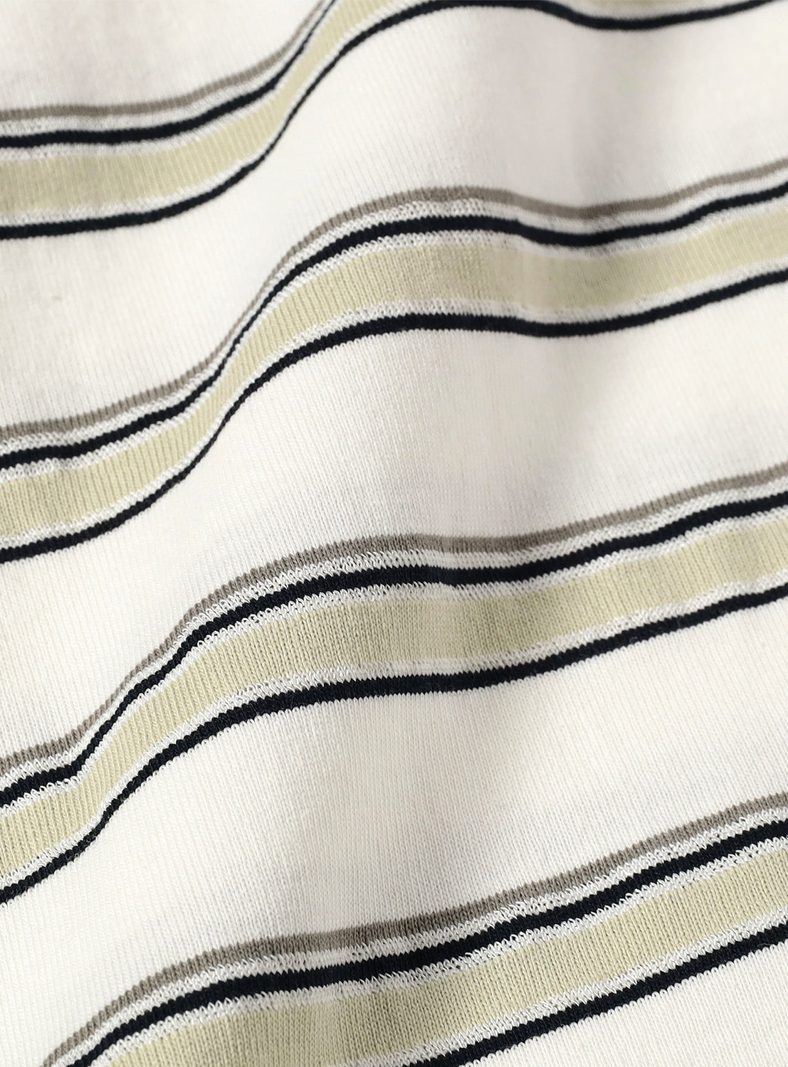 Close-up of the striped material, highlighting the fabric quality and unique stripe pattern.