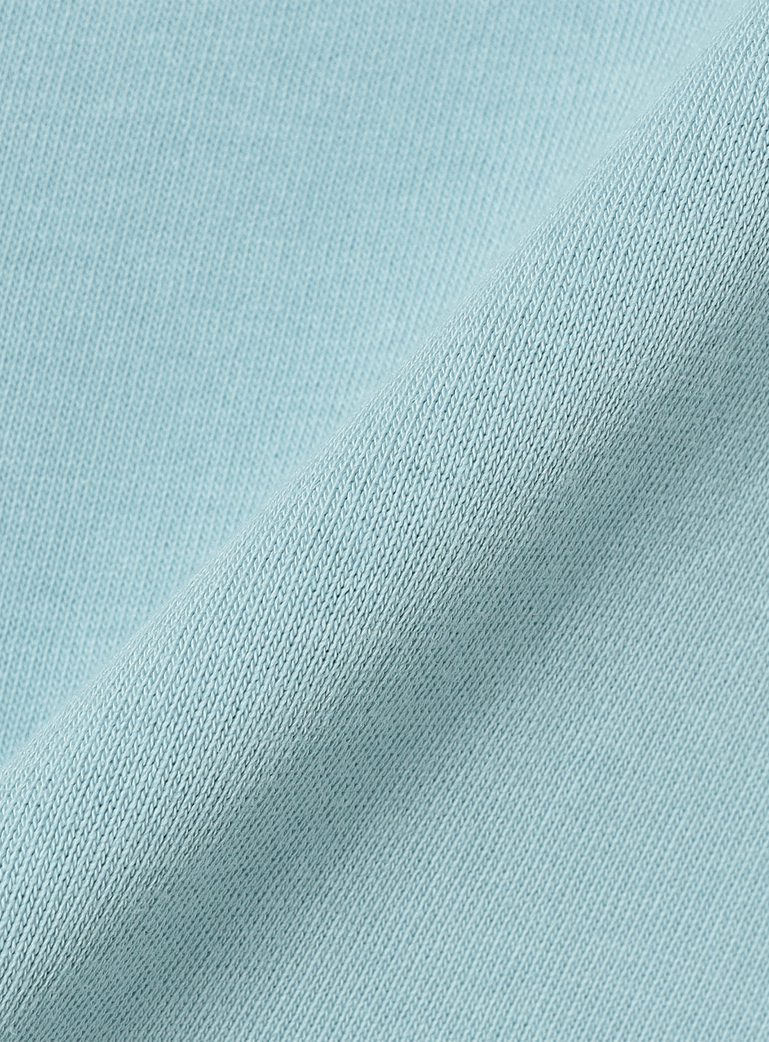 Close-up of the baby blue material, highlighting the fabric quality