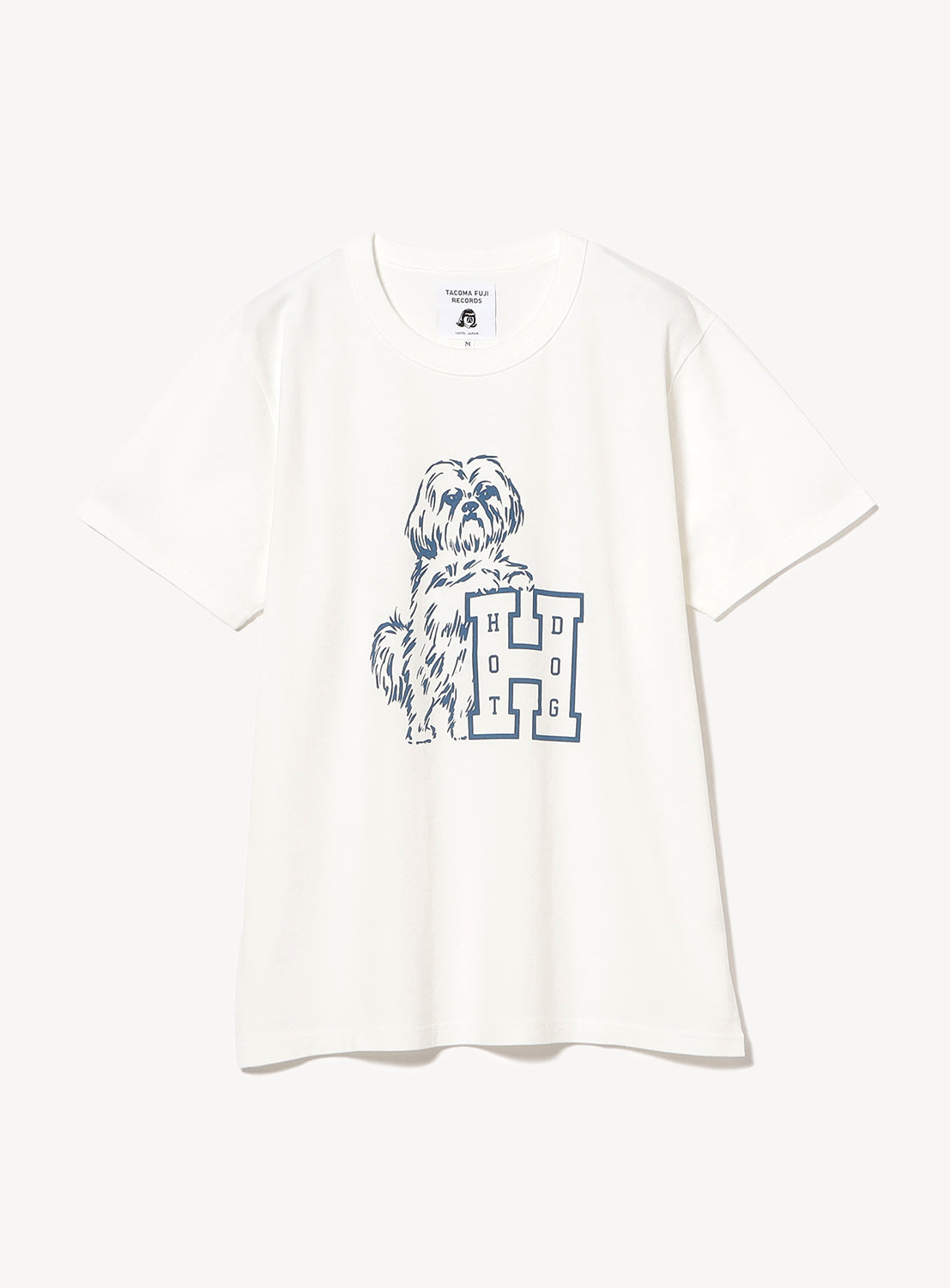 White t-shirt flat lay, featuring a blue graphic print of a dog and abstract graphic on the front.