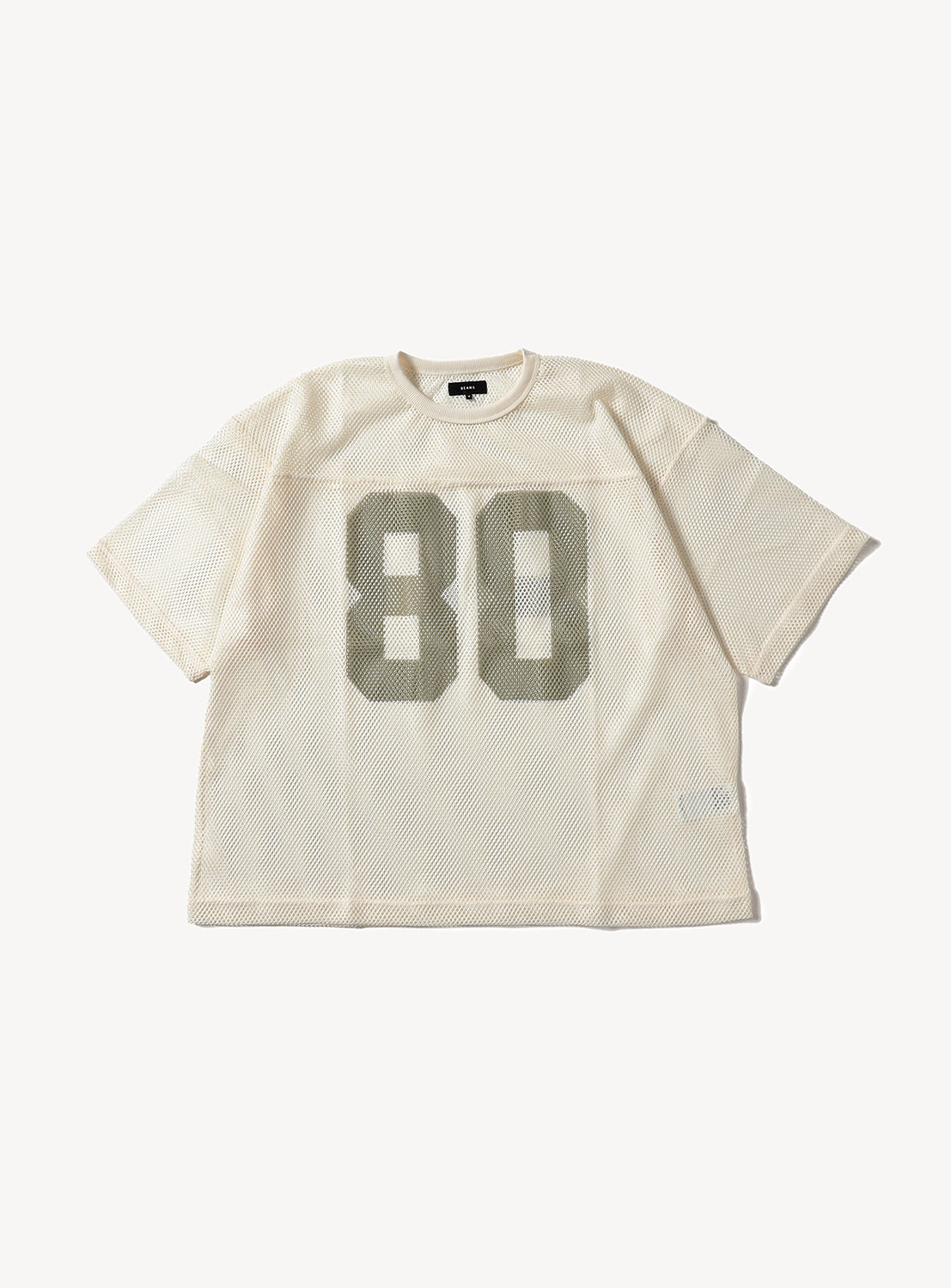 Cream mesh football jersey flat lay, featuring large grey "80" numbers on the front.