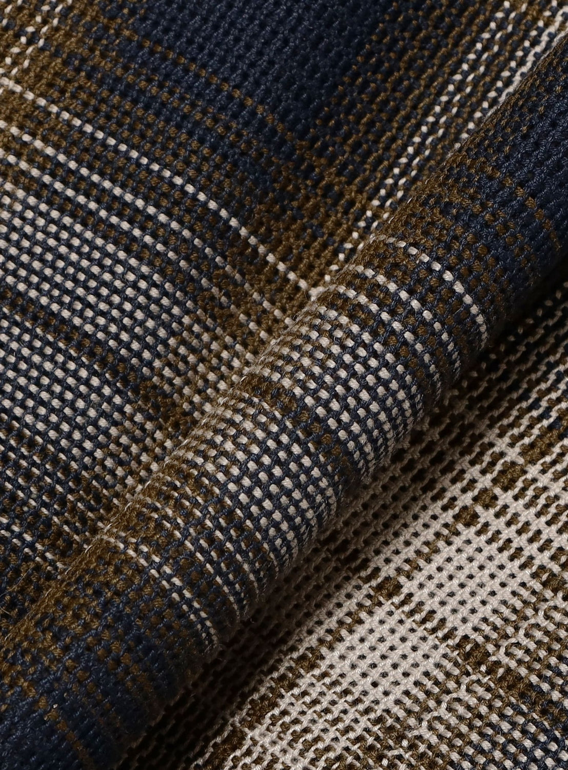Close-up of a blue, olive green, and cream plaid mesh fabric with a visible grid texture on a BEAMS Classic Check Mesh Zip-Up Shirt.