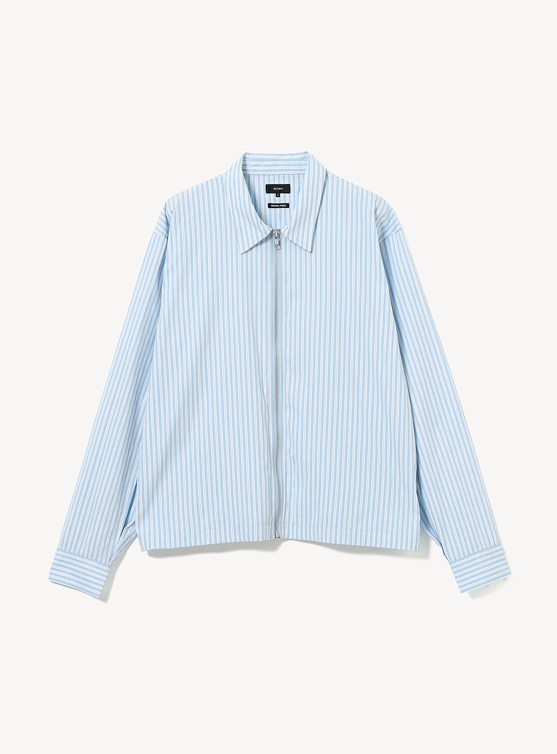 BEAMS Striped Zip-Up Shirt featuring a long-sleeve collared design with a full zip-up front and light blue and white vertical stripes.
