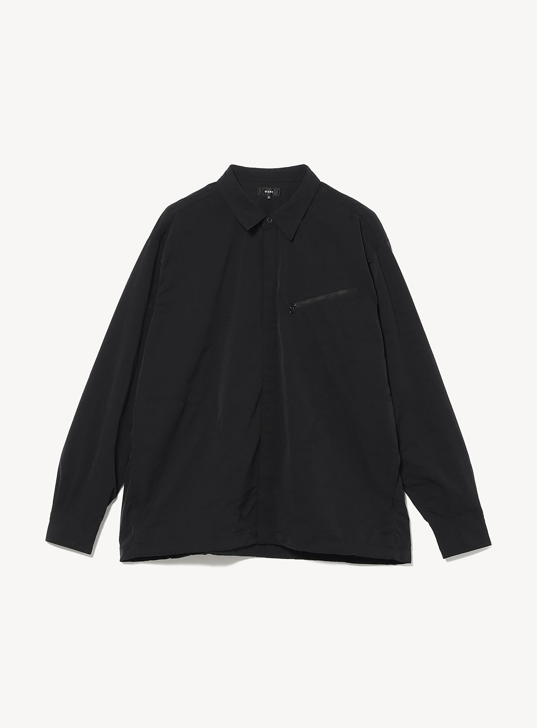BEAMS Tech Shirt: a long-sleeved black button-down shirt in stretch fabric with a zippered chest pocket.