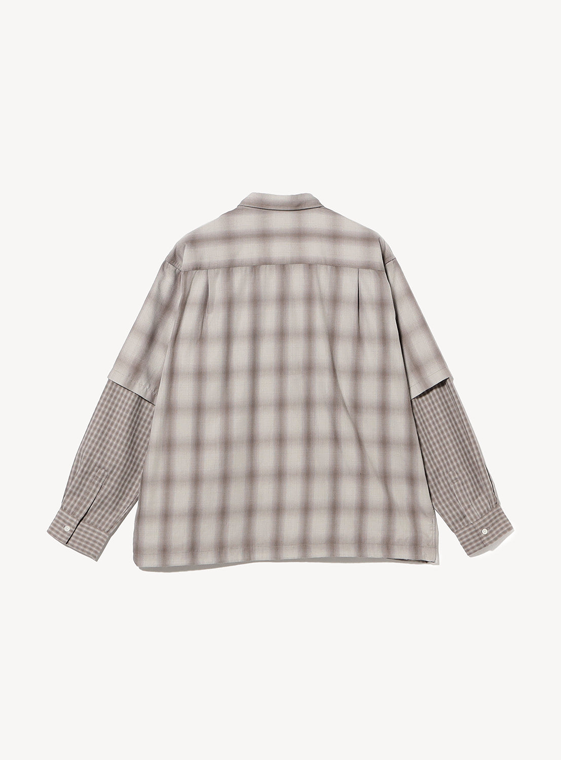 Back view of a BEAMS Layered Check Shirt, a wide fit long-sleeve shirt with a blurred plaid pattern on the torso and a small gingham check pattern on the sleeves.