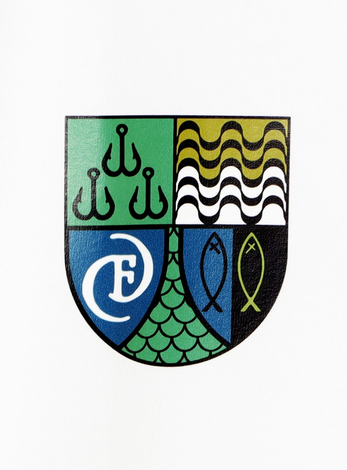 A shield-shaped Chaos Fishing Club Coat Of Arms T-Shirt emblem divided into four quadrants featuring three fish hooks, wavy black and white lines, a stylized letter F, and two fish.