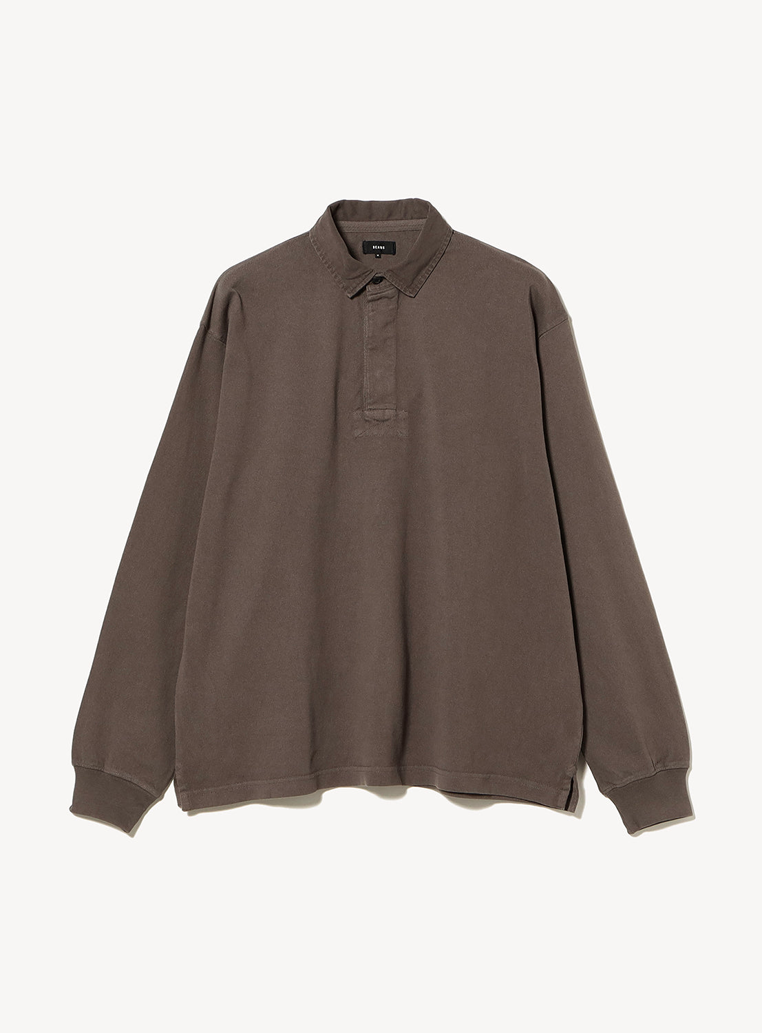 BEAMS Garment-Dyed Rugby Shirt in brown, crafted from heavyweight cotton jersey with long sleeves, a collared neckline, and a button placket.