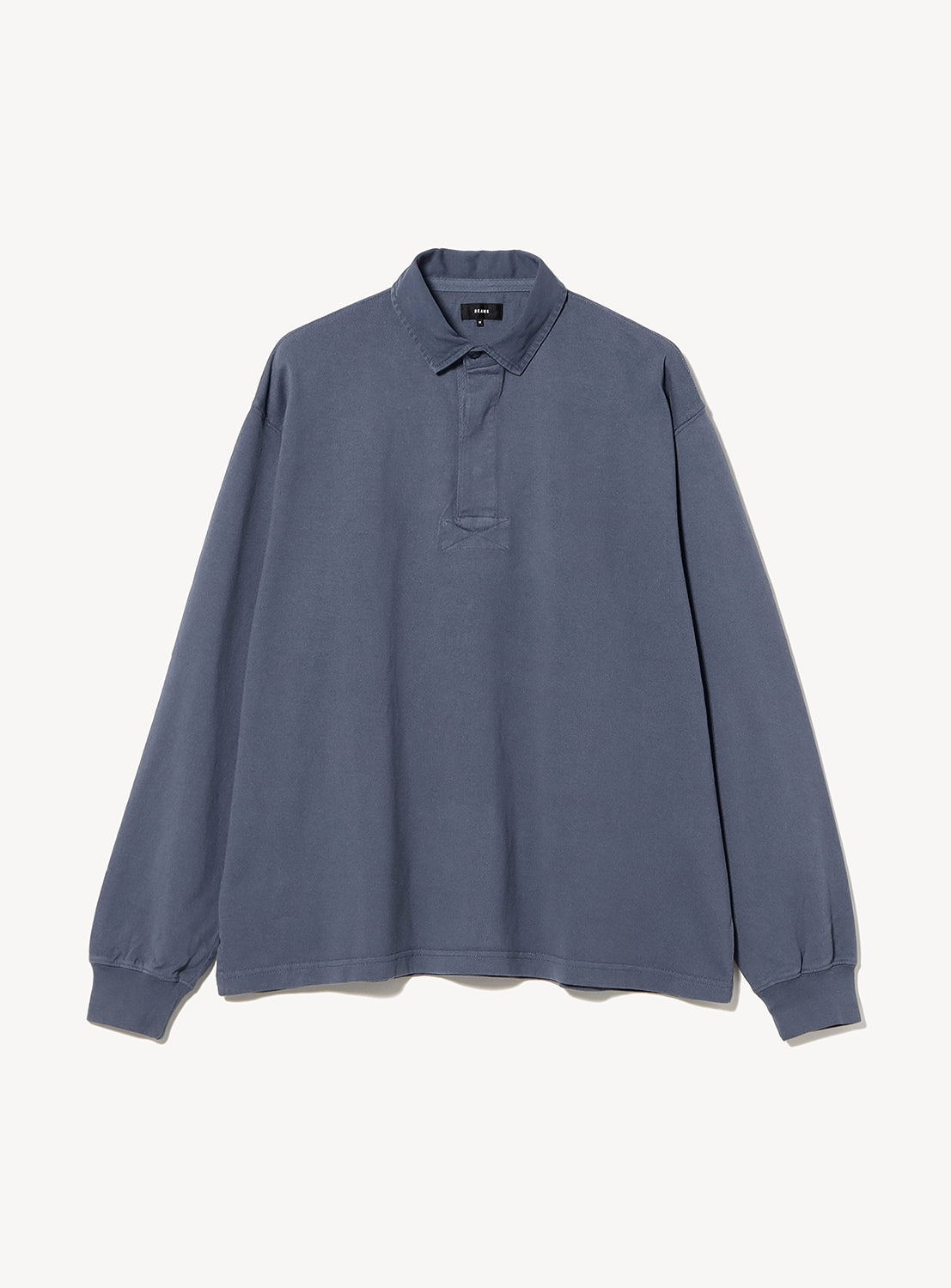 BEAMS Garment-Dyed Rugby Shirt in slate blue, crafted from heavyweight cotton jersey with a collar and a button placket.