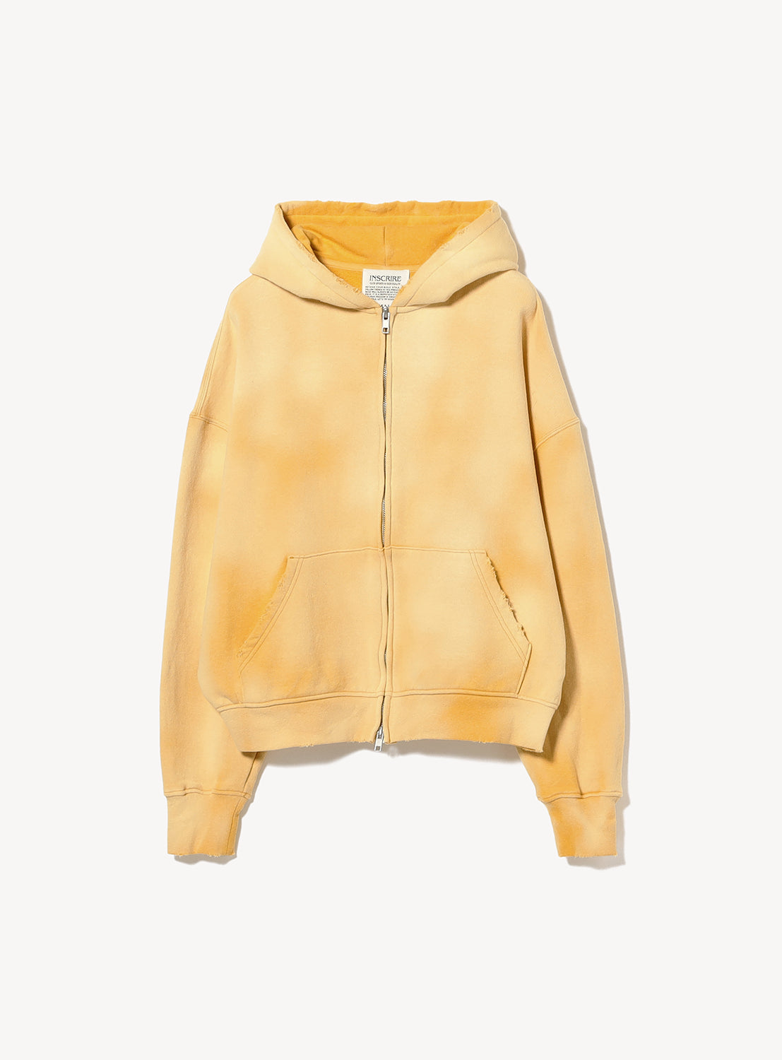 The INSCRIRE Yellow Faded Zip Up Hoodie is an oversized zip-up style made from soft French terry, featuring a hood, front pockets, and ribbed cuffs. It is displayed against a plain white background.