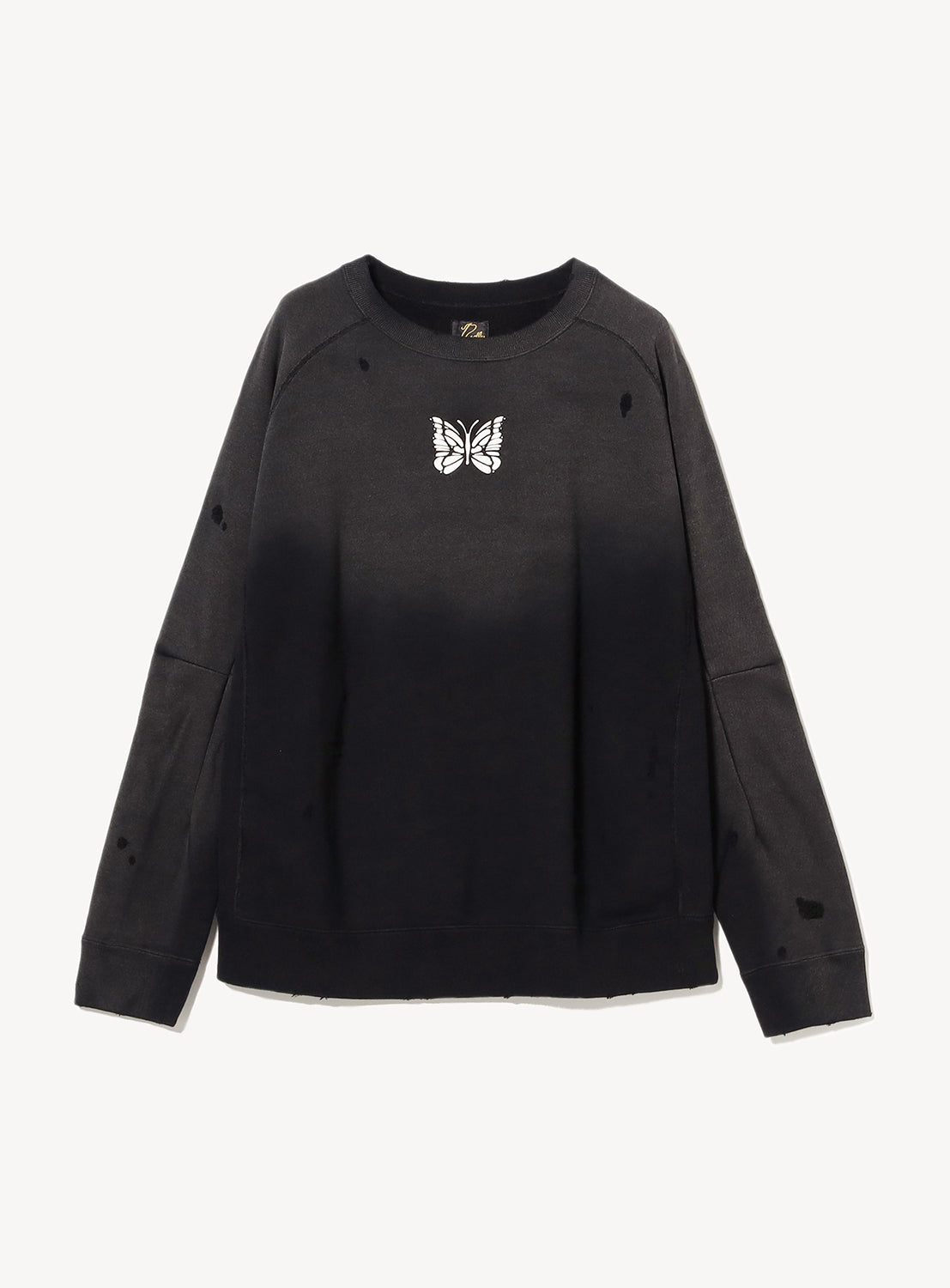 Black distressed and faded sweatshirt with a butterfly design in white. 