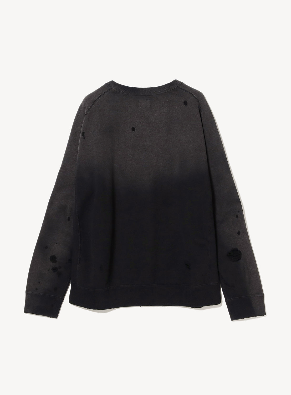 Back of a black distressed and faded sweatshirt with a butterfly design in white. 