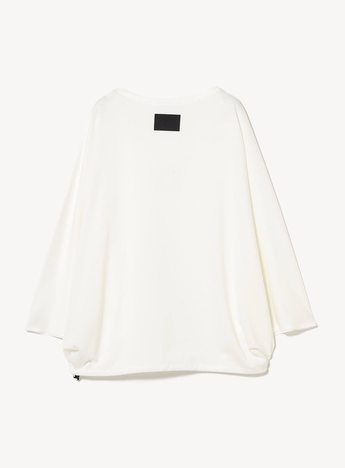 Back of white diamond cut shirt. 