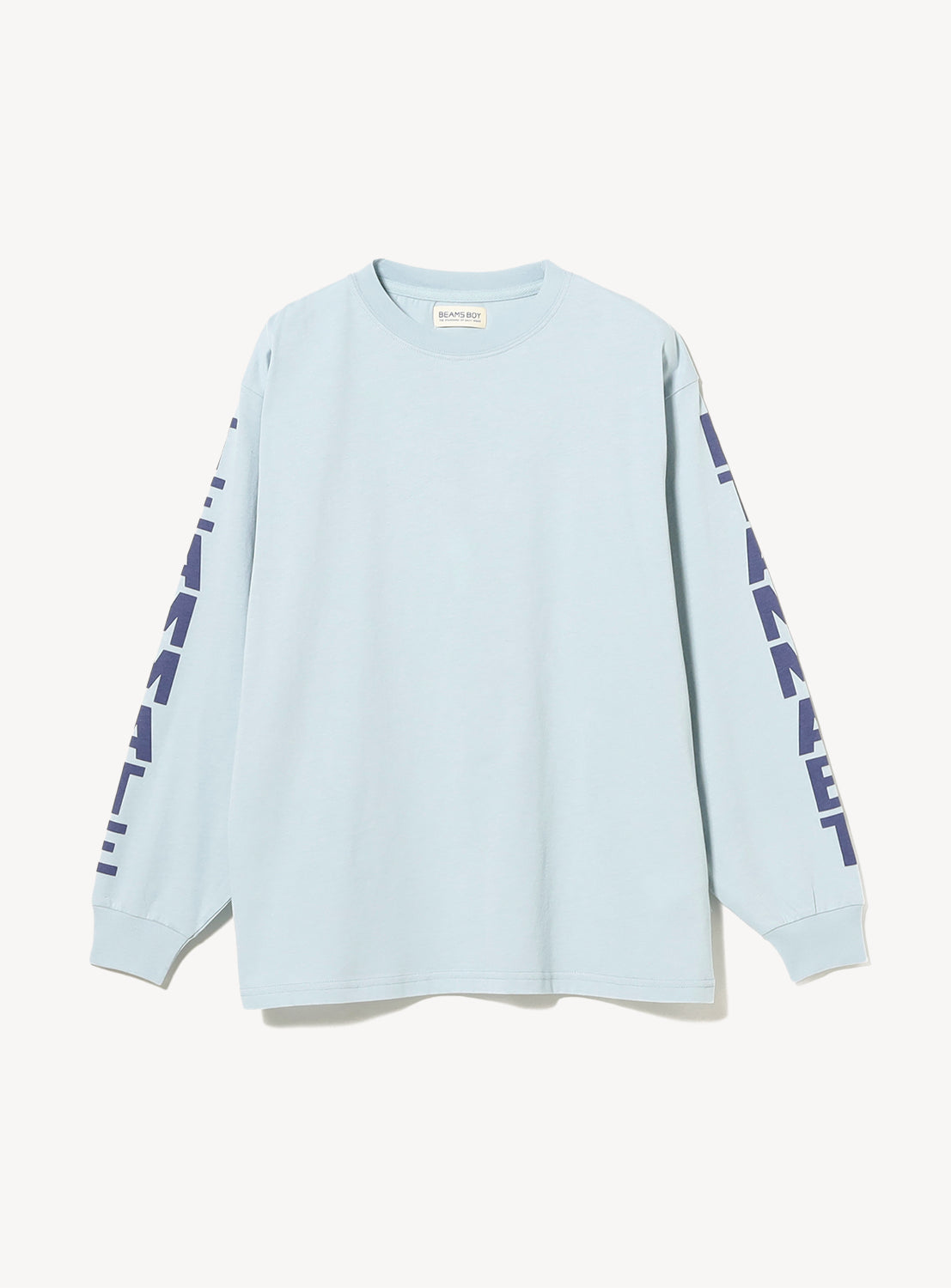 The BEAMS BOY Big Logo Long-Sleeve T-Shirt is a light blue, relaxed fit top with bold, dark blue oversized logos running vertically down both sleeves. The shirt is showcased against a plain white background.