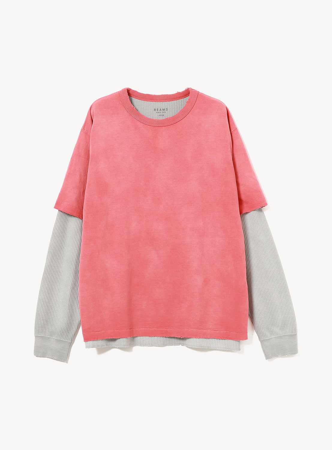BEAMS Vintage Layered Fade Long-Sleeve T-Shirt consisting of a pink short-sleeved t-shirt layered over a grey thermal long-sleeve shirt with distressed hems.