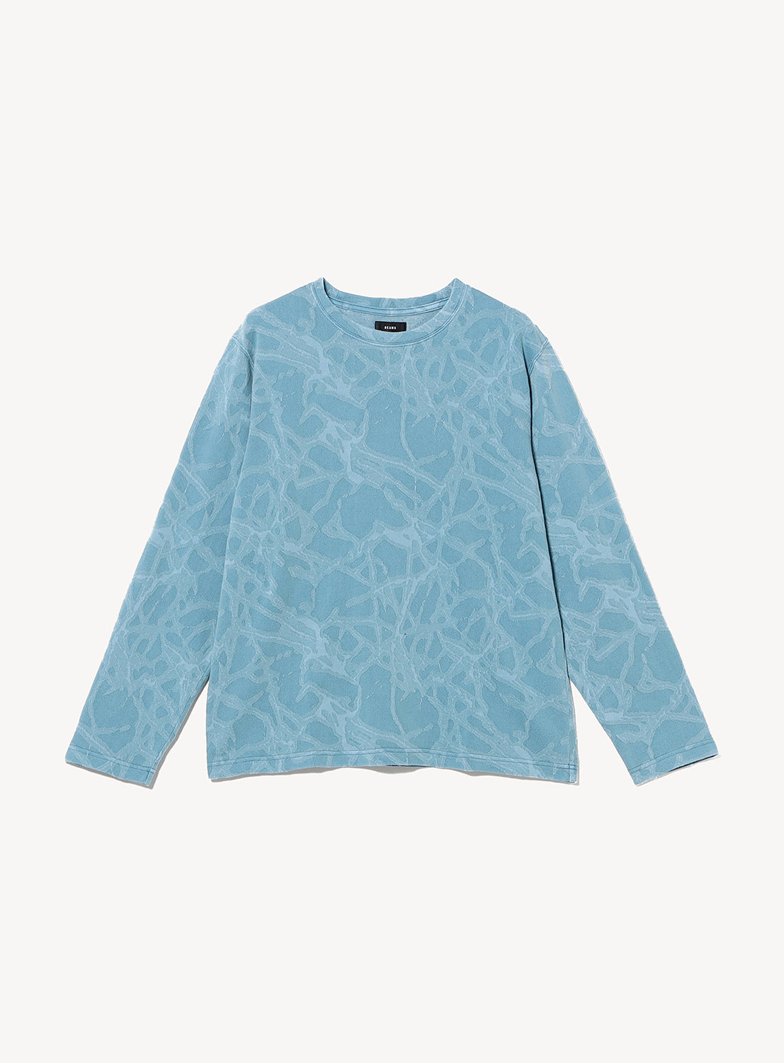 BEAMS Lightning Jacquard Long Sleeve T-Shirt in light blue, featuring a tonal, repeating lightning bolt jacquard pattern and a vintage-inspired wash.