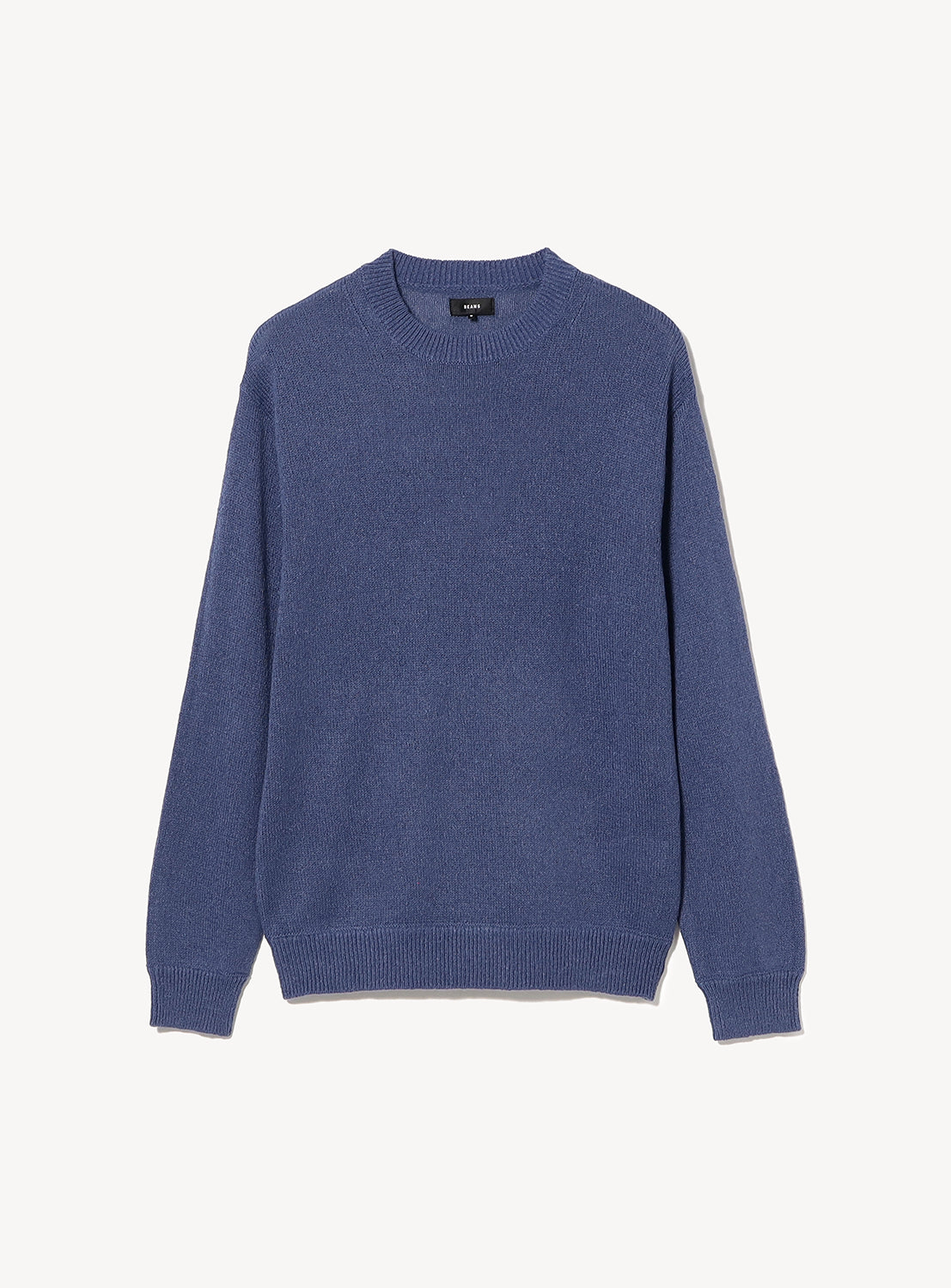 BEAMS 7-Gauge Washi Crew Neck Knit is a blue long-sleeve crewneck sweater with a relaxed silhouette and melange finish.